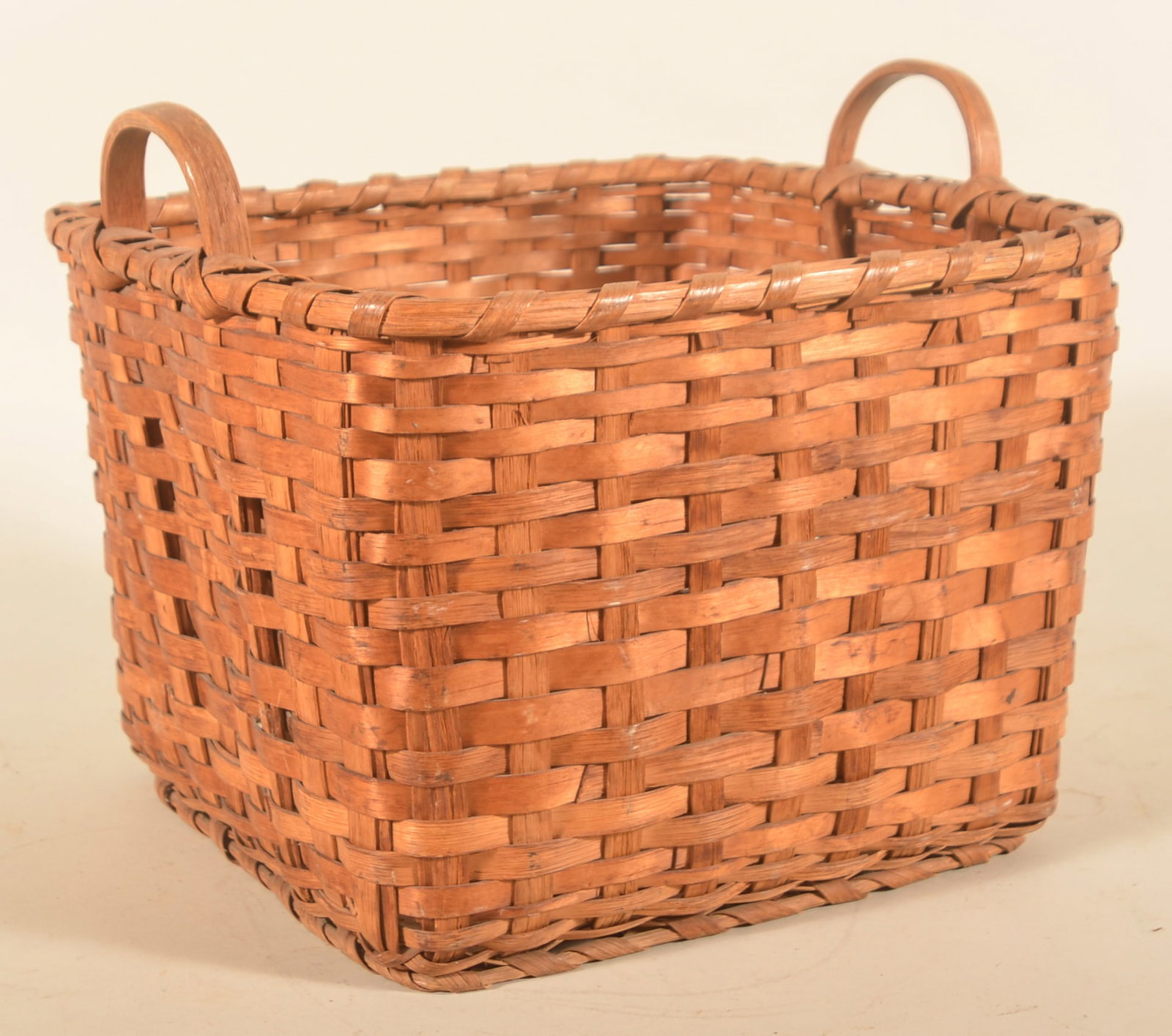 Antique Square Splint Oak PA Gathering Basket: Unusual square form found in Berks County. Two carved oak handles with a braided base. Warm patina. 12 1/2"H x 15"W
