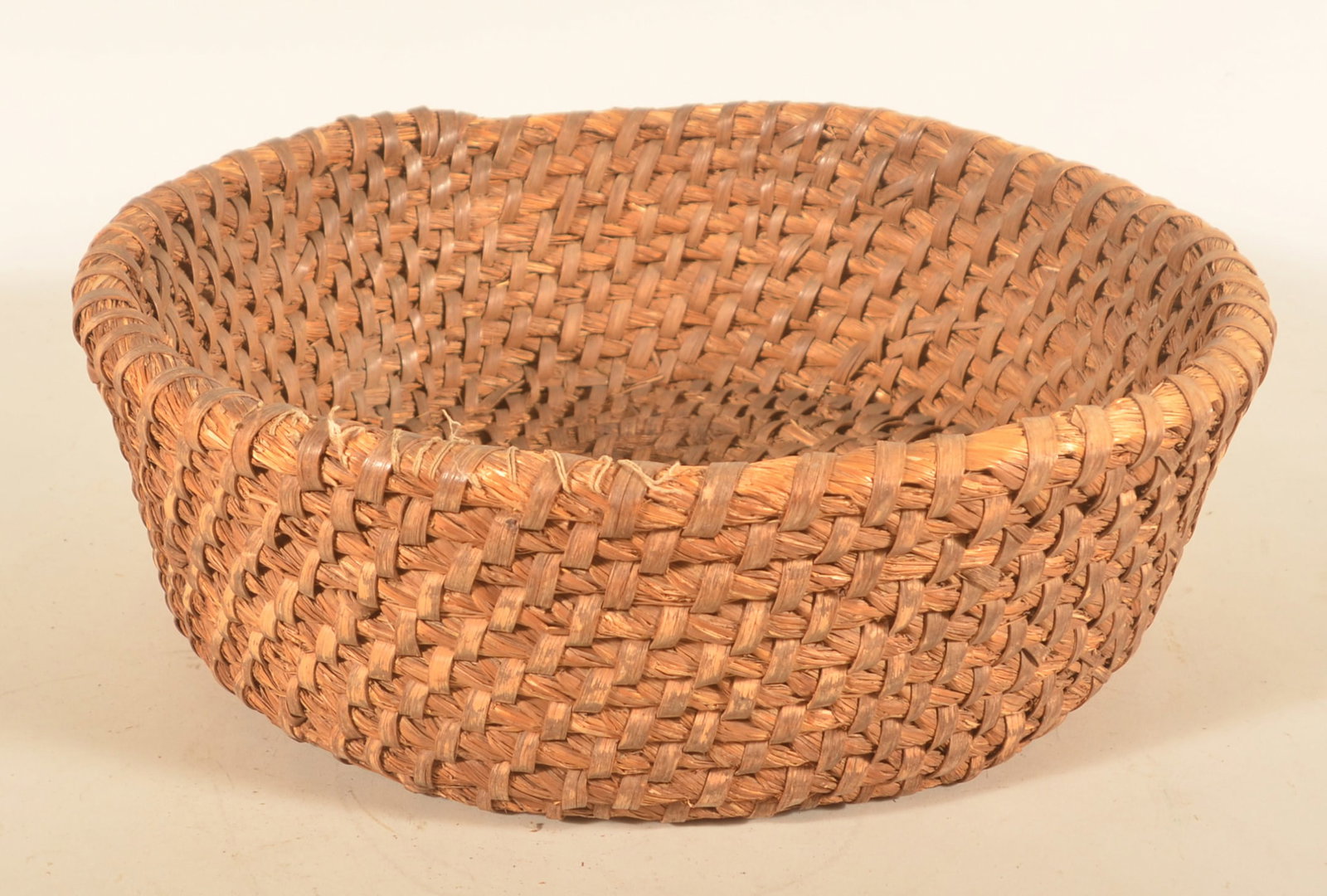 Large Antique Rye Straw Basket: Large gathering basket with good patina. 6 1/2"H x 18 1/2"D