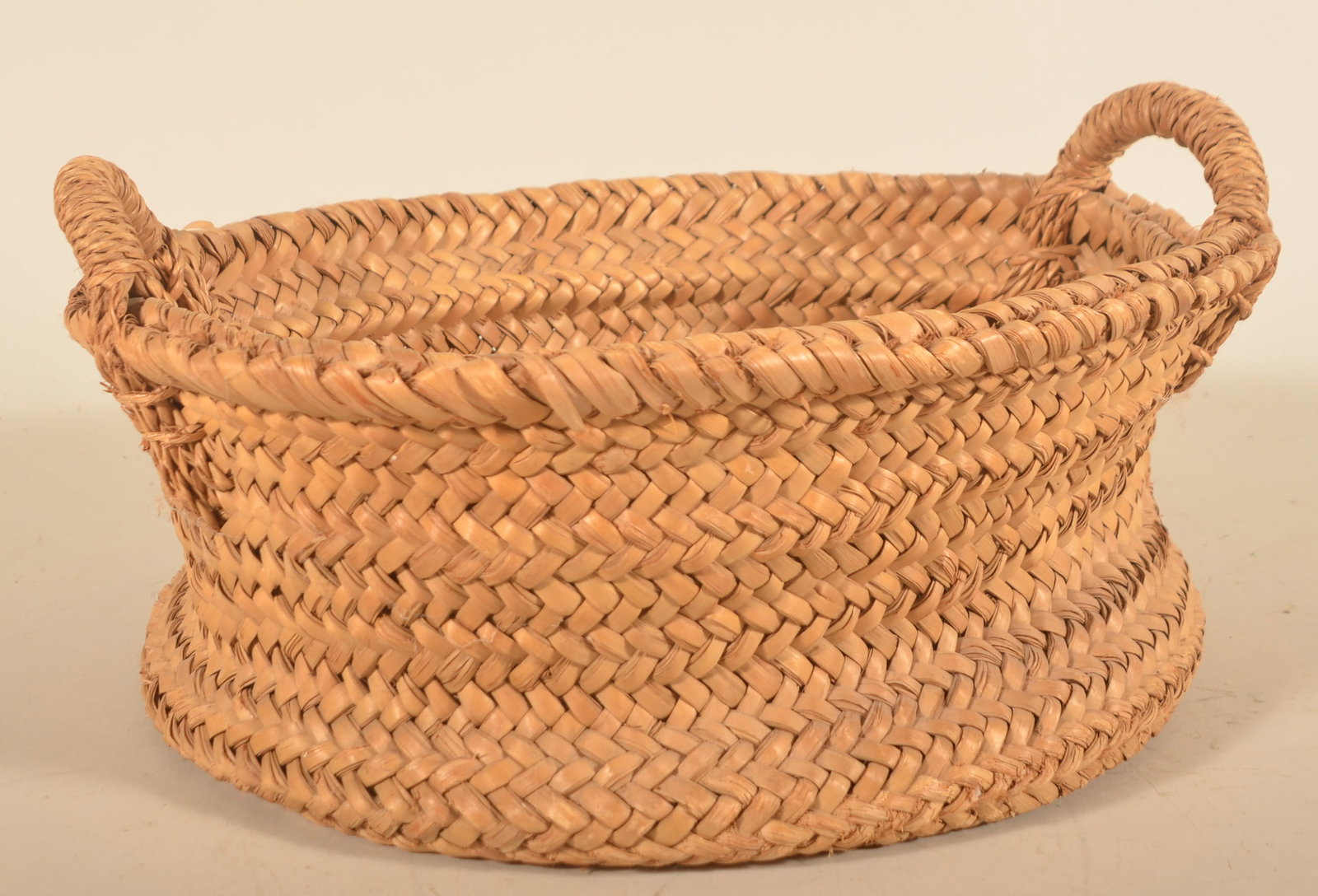 1920s Armstrong Cork Co. Sorting Basket: Used to sort corks at the Armstrong Cork Co. in Pittsburgh, Pa. with written history attached to the basket. Belonged to Samuel Dyke who started with this company in 1929. 7 1/2"H x 16"W
