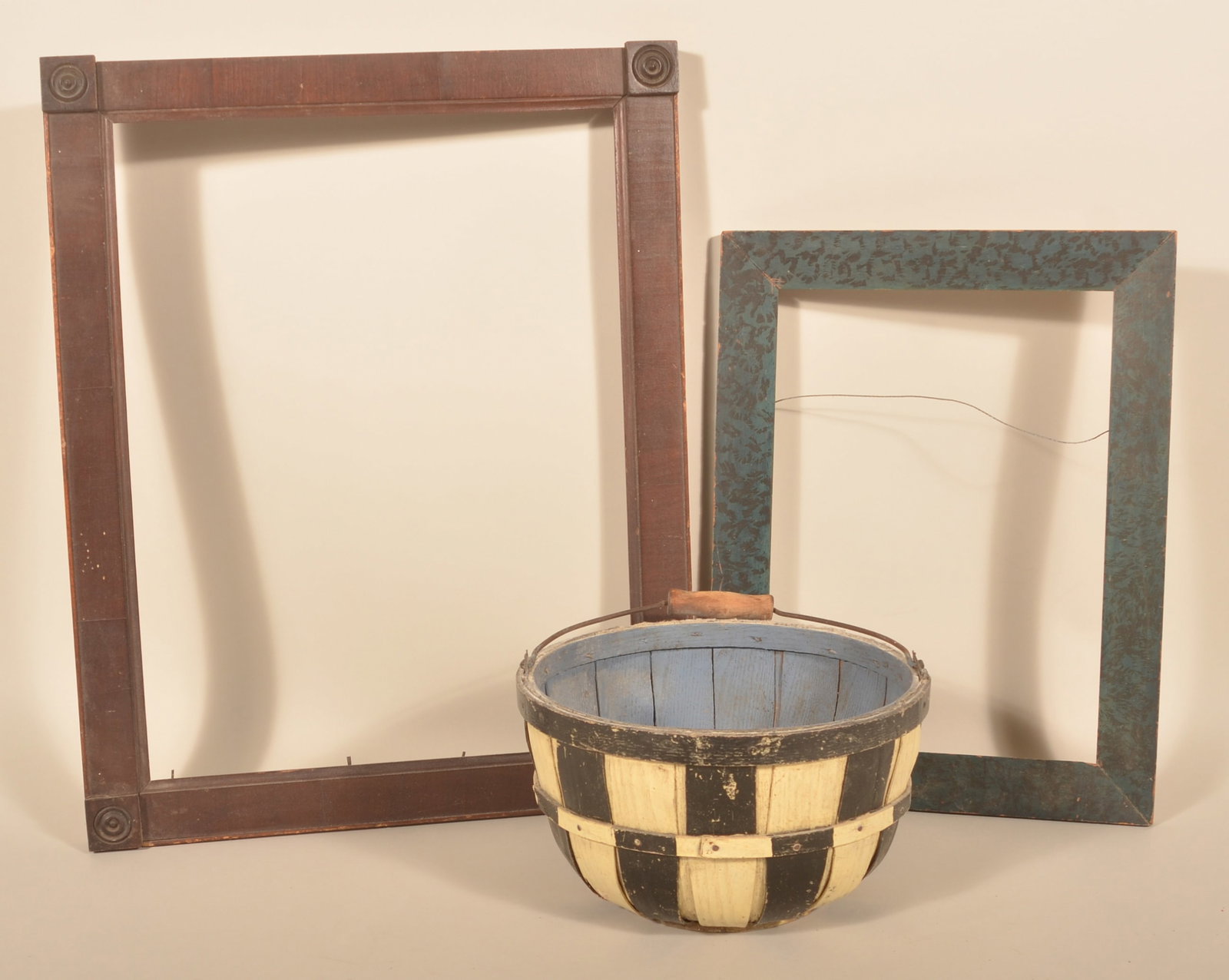 Great Blue Paint-Decorated Frame & Painted Basket: Wonderful Currier & Ives-style mid-19th-century paint-decorated frame in blue with black sponging. Together with a black and white checkerboard-style painted apple basket with a blue interior and an