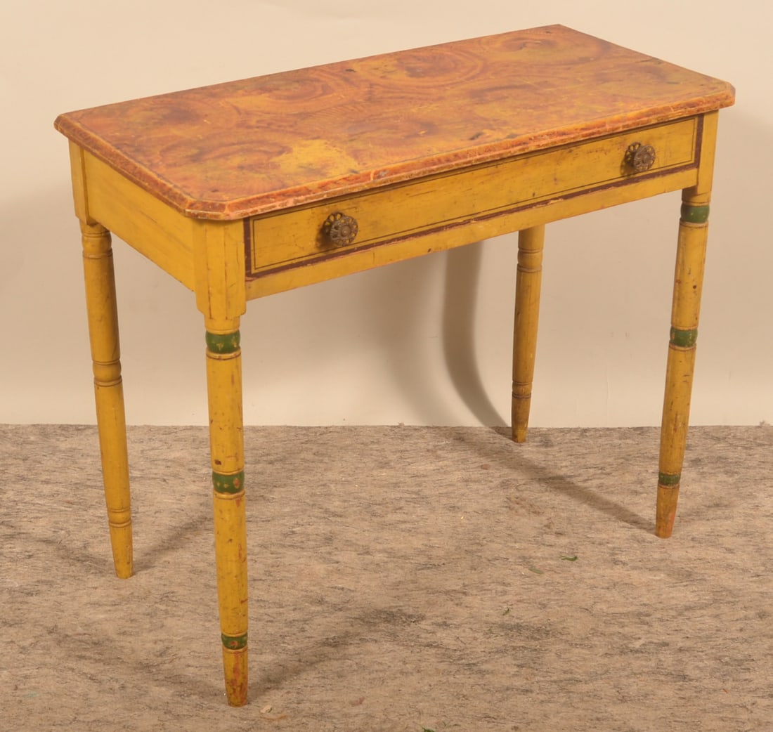 Early Paint-Decorated New York Dressing Table: Pine, single dovetailed drawer, turned legs, beveled-edge top, ca. 1840. Original paint with sponge decoration on top. Mustard with green brown and black highlights. Original brass pulls. 28 3/4" x 34