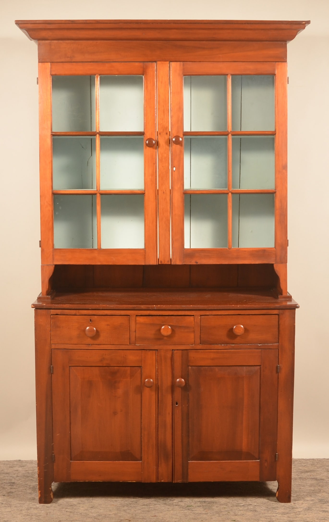Pennsylvania 12-Pane Step-Back Dutch Cupboard: 2-piece cupboard with bracket feet, two doors with six panes of glass each, three dovetailed drawers over two raised-panel doors. Nice pie shelf for display. 84"H x 48"W x 18 3/4"D