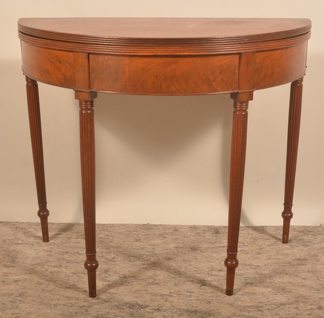 Sheraton-Style Mahogany Flip-Top Game Table: Gate-leg table with fluted legs. Mid-19th century. 30 1/2" x 35 1/2" x 36" (when opened)