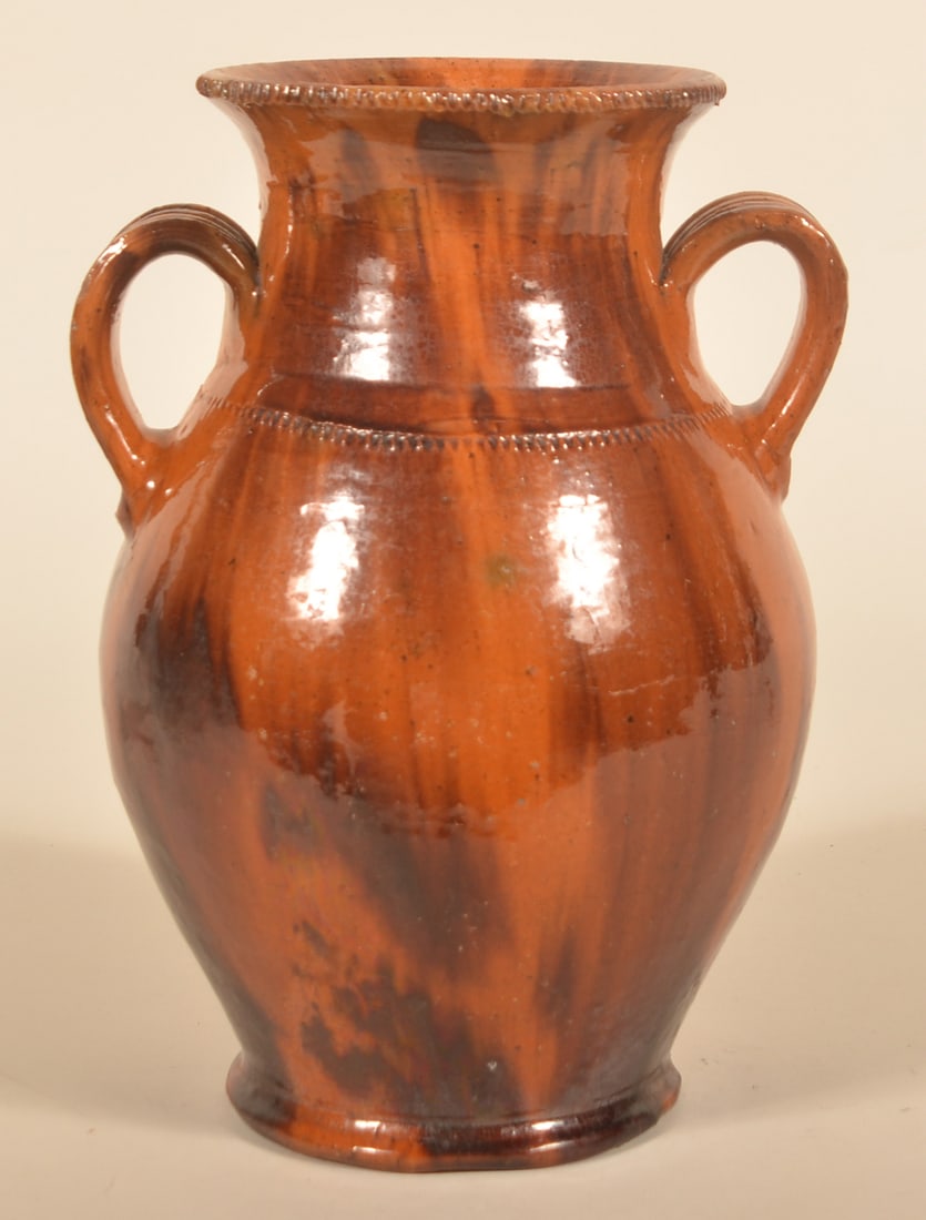 Jacob Medinger Redware Double-Handled Urn: Attributed to Jacob Medinger who worked in Montgomery County, Pa. Beautiful glaze and colors. 11 1/4"H