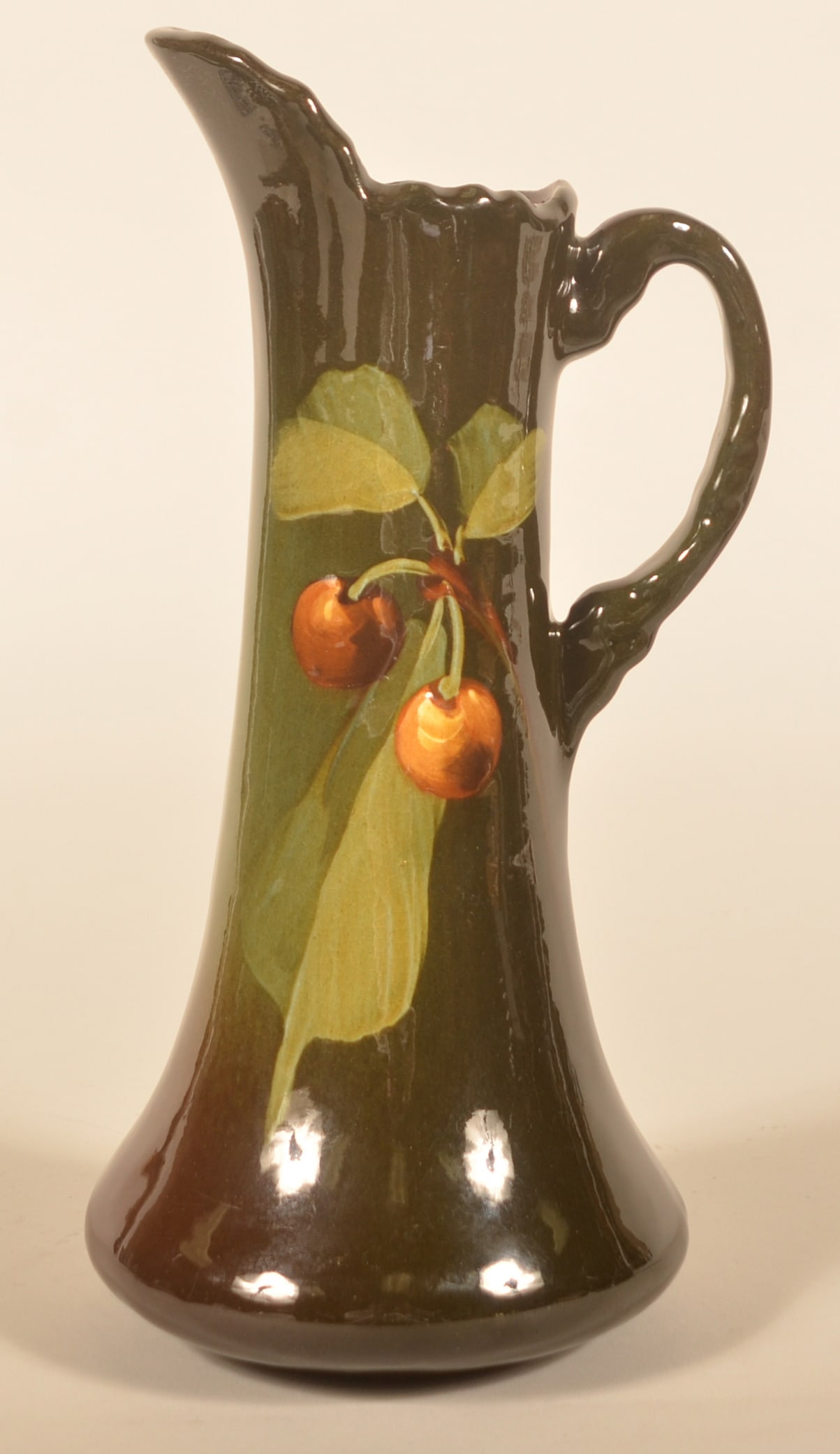 Weller Pottery Hand-Decorated Lemonade Pitcher: Tall pitcher with hand-decorated cherries in a very nice glaze. 12"H