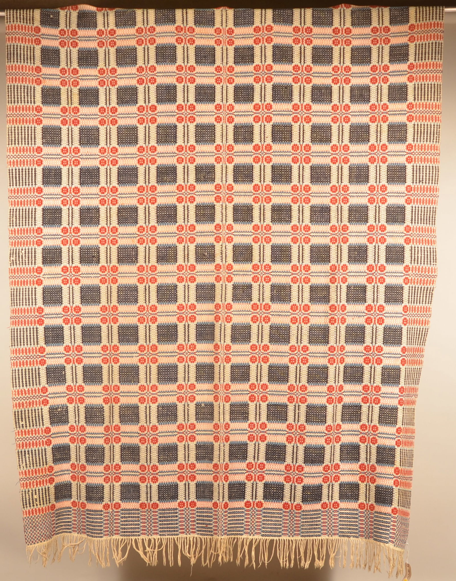 Antique Red/White/Blue PA Woven Coverlet: Center seam overshot coverlet with bold colors. Fringe at the foot only. 88"L x 72"W