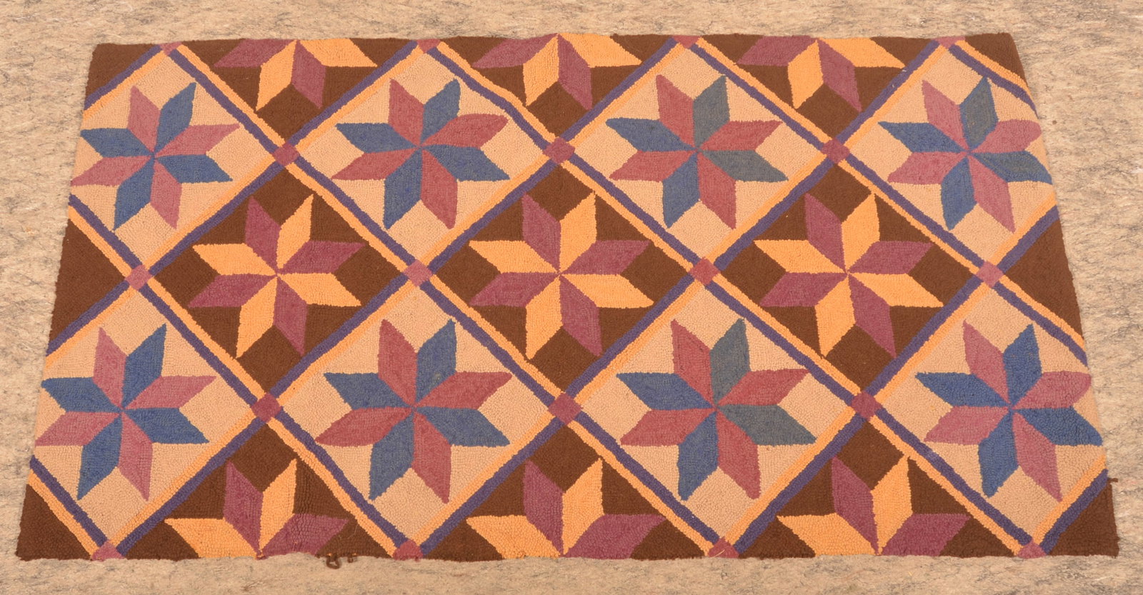 Antique Diamond & Star Pennsylvania Hooked Rug: Attractive colors and design. Central Pennsylvania, ca. 1910-1920. 29" x 53 1/2"