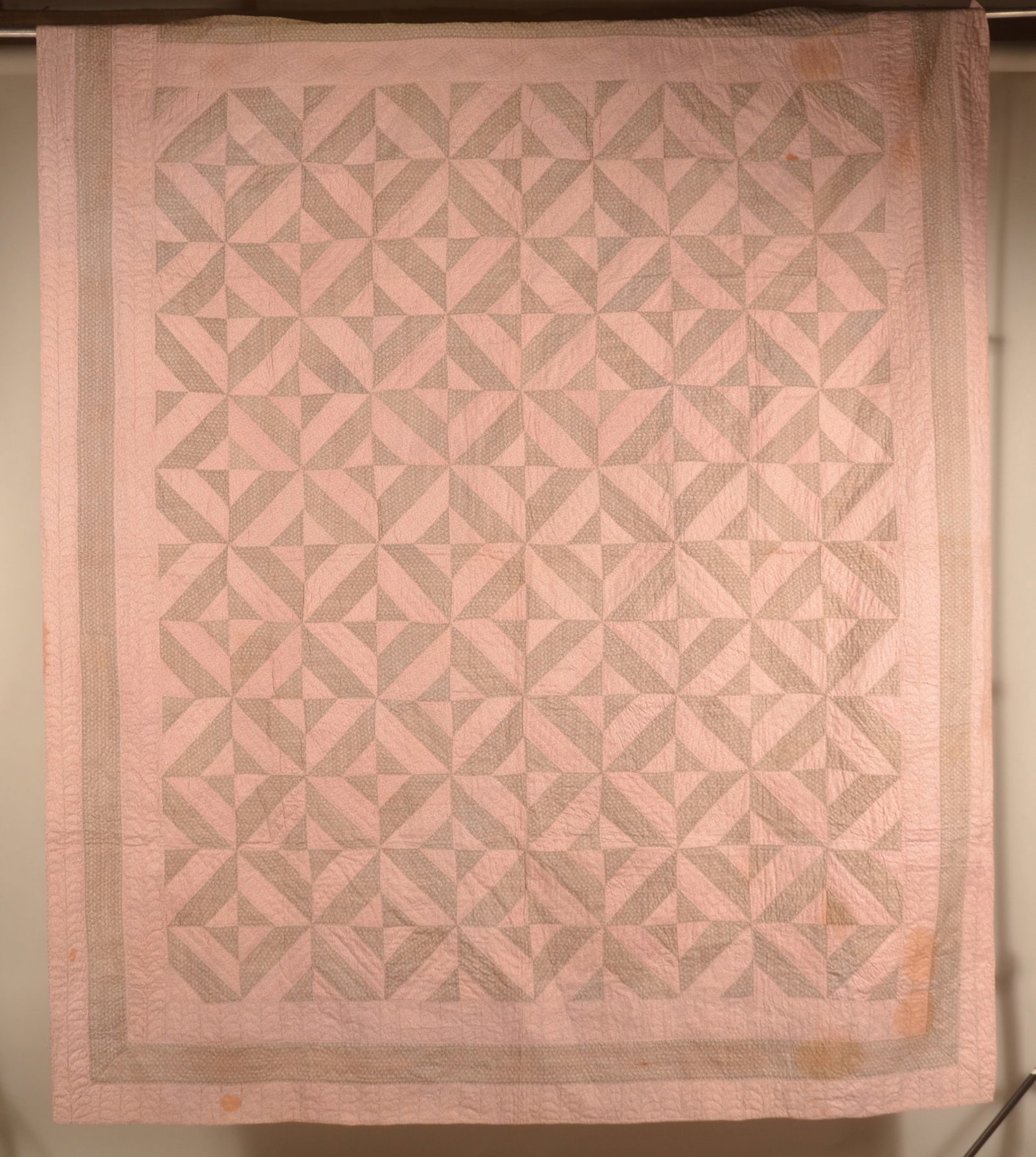 Antique Geometric Quilt w/ Stenciled Name: Large hand-stitched quilt, early-20th century, stenciled with owner's name "Flora E. Merkel" directly on the backing and also on an applied piece of cotton. 86" x 100"