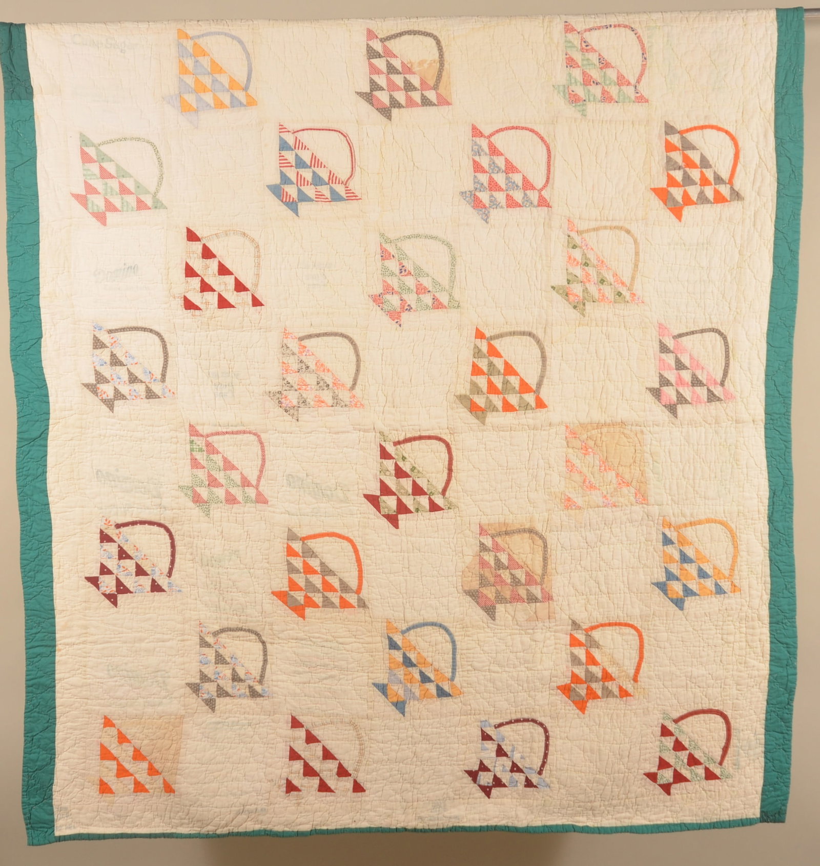 Basket Pattern Flour Sack Quilt: Vintage 1930s quilt made from flour sacks, some of the printing is clearly visible. Nice smaller youth size. 62" x 68"