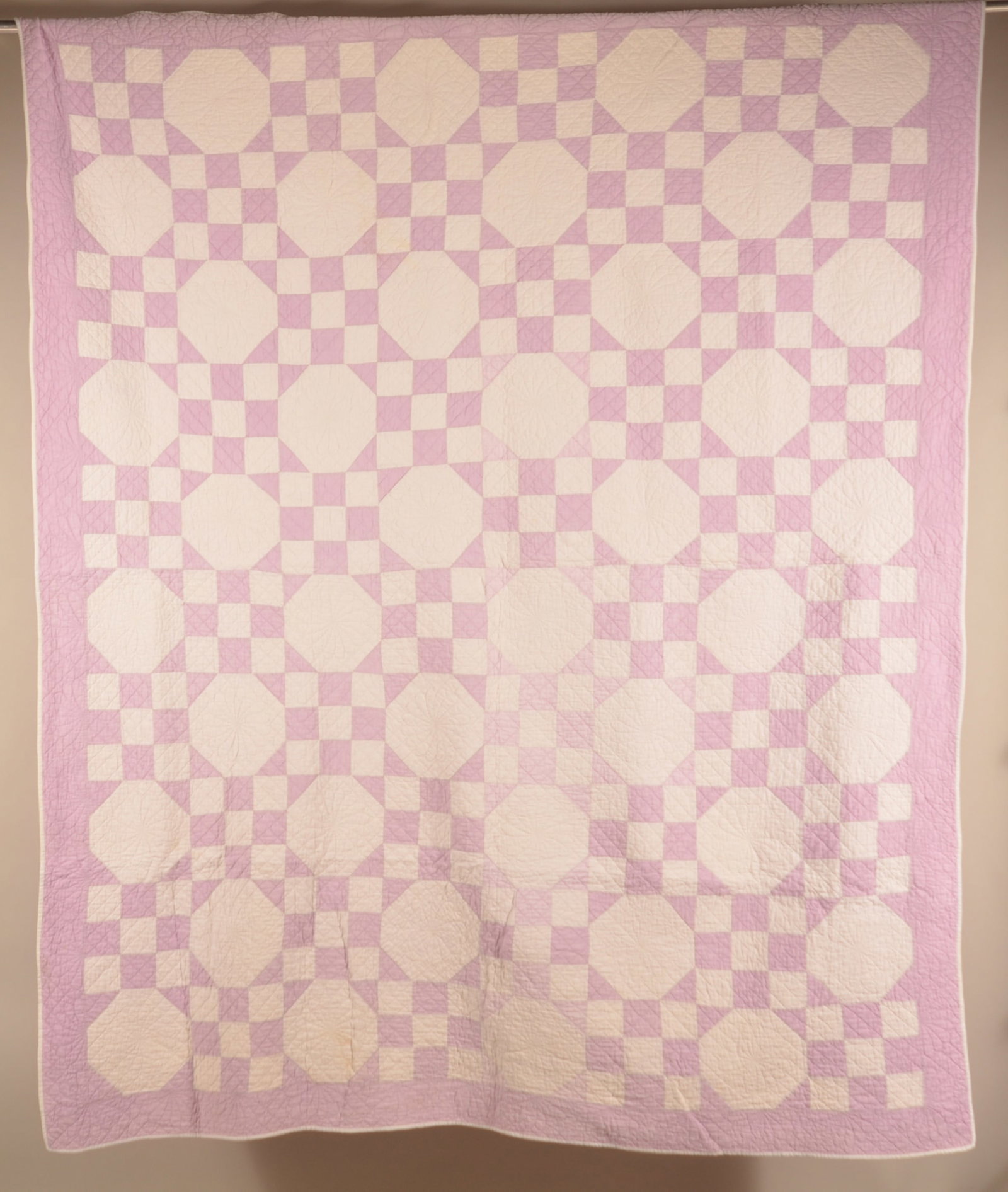 9-Patch Variant Hand-Stitched Quilt: 1930s quilt in purple and white with nice design. 74" x 88"