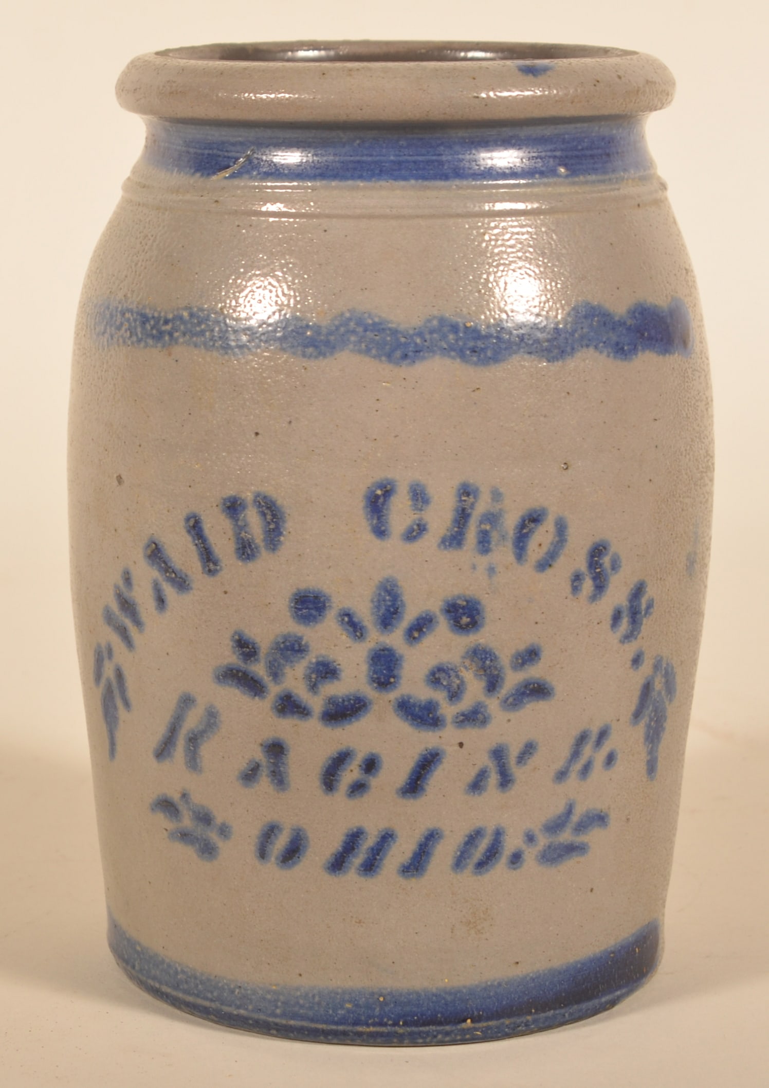 Waid Cross Racine, OH 1-Gallon Stoneware Crock: Very nice stenciled crock with freehand stripes. Advertising Waid Cross (1835-1912) who was a grain merchant in Racine, Ohio. Jar was most likely made in Greensboro, Pa. Strong cobalt blue and nice co