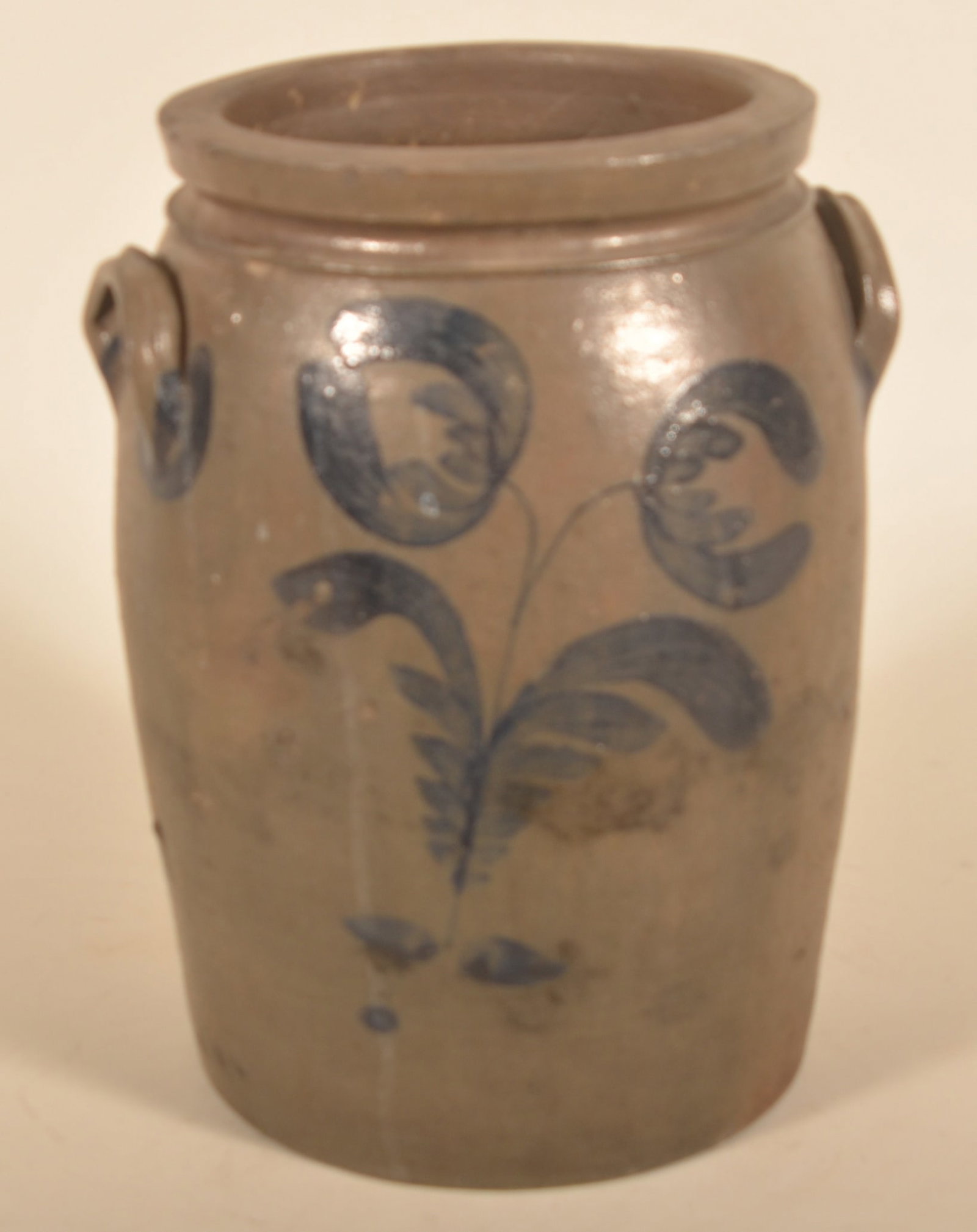 5-Gal. George & Albert Black Sommerfield Crock: Impressed "5" with typical freehand flower decoration and blue highlights under the ends of each handle. Uncommon to find this size. 15 1/4"H