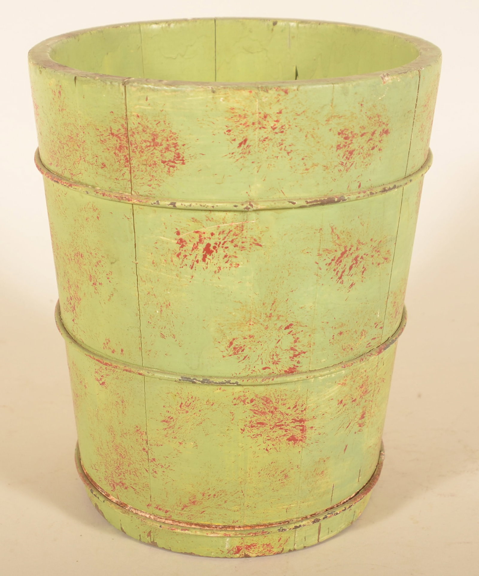 Antique Paint-Decorated Dry Measure: Early-20th-century wood measure with wire bands painted lime green with red sponge paint decoration. 10 3/4"H