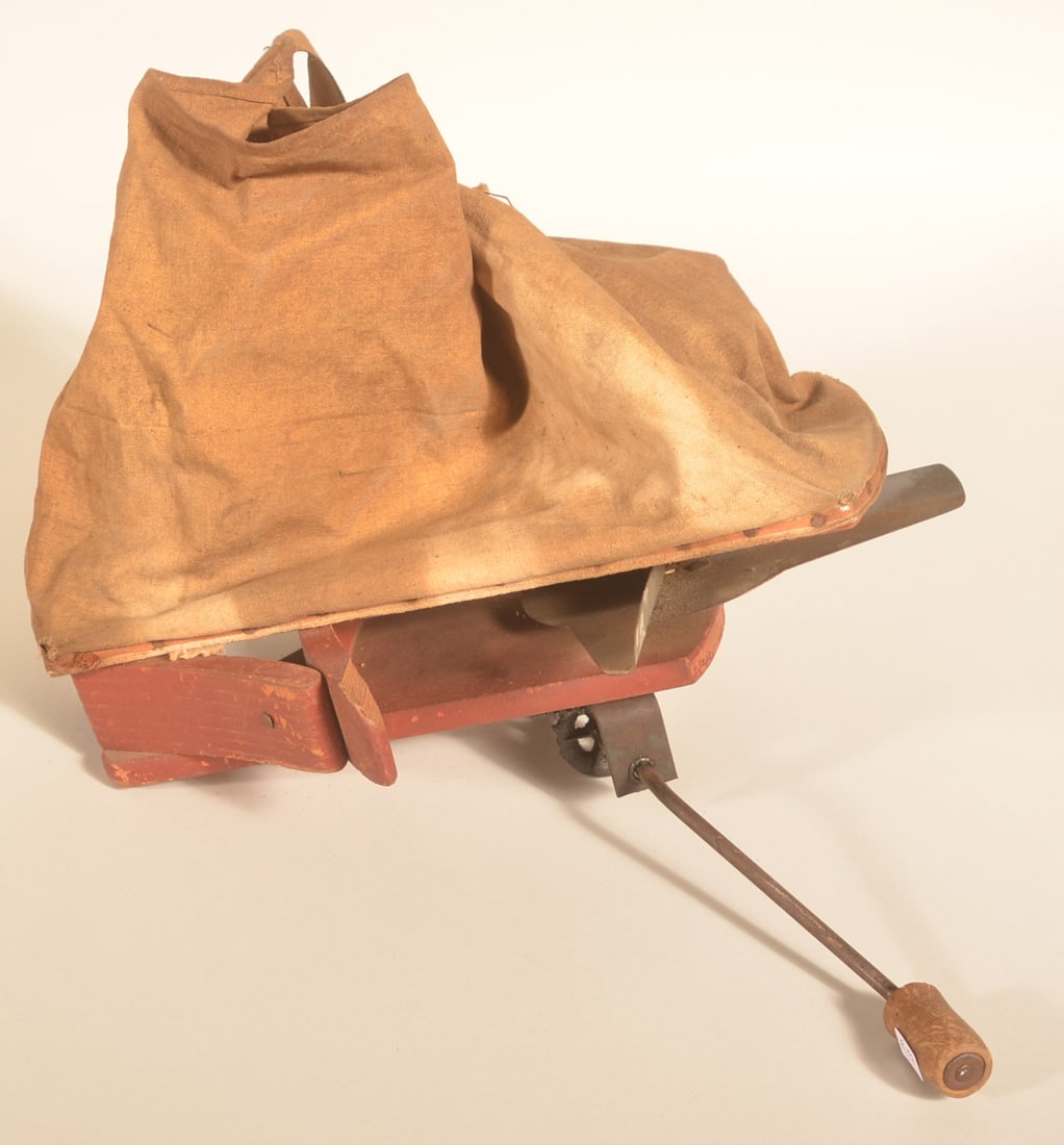 Primitive Hand Carried Seed Spreader: Late-19th-century wood, iron, canvas and metal seed spreader. Nice farm primitive in the original paint. 16"L