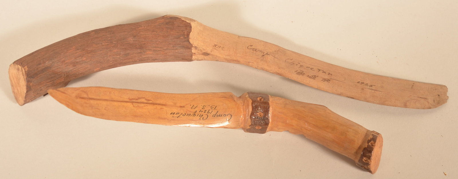 Two Carved Wood Camp Chiquetan Boy Scout Knives: The Boy Scout camp was located in Conestoga, Pa until 1975. Knives are dated 1924 and 1925. Carved from tree branches. Longest, 15"L