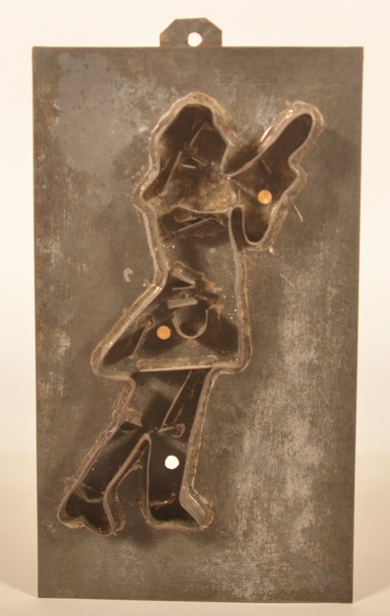 Large Antique Tin "Town Crier" Cookie Cutter: Wonderful form and size. Includes a receipt dated 10/14/1979 from when it was purchased at Three Ravens Antique Shop in Falls Village, CT. Folded tin edge and pressed-tin hanger are nice details.