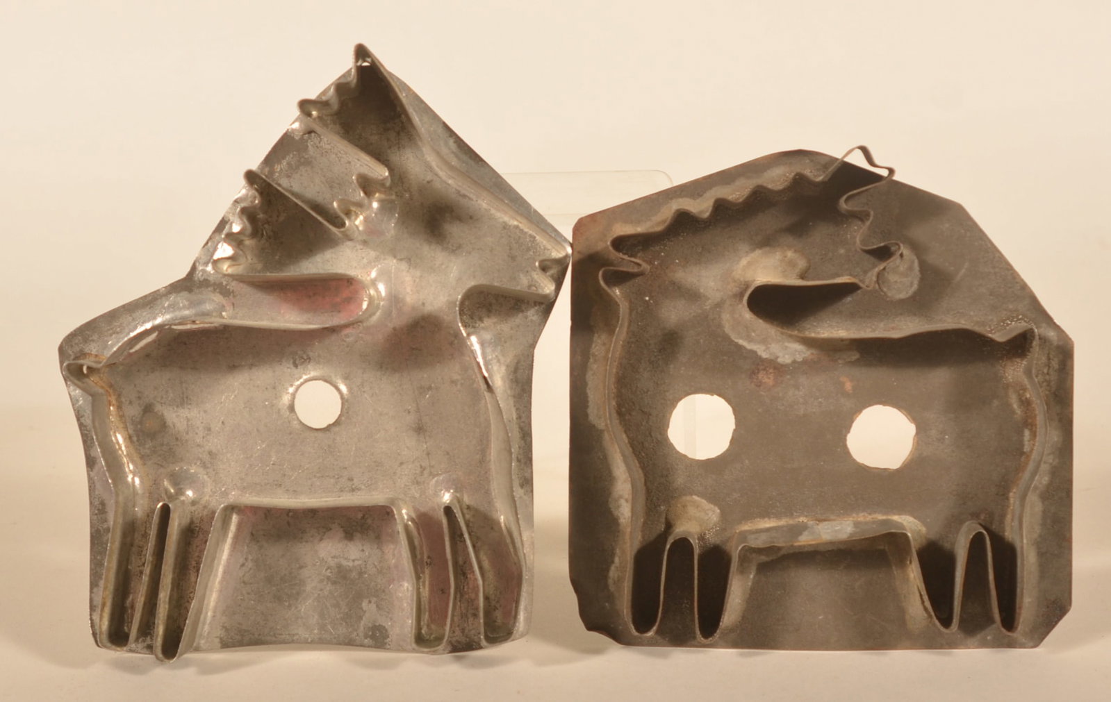 Left & Right Facing Reindeer Tin Cookie Cutters: Very nice set of antique tin cookie cutters. Just in time for Christmas. Taller, 5 1/2"H
