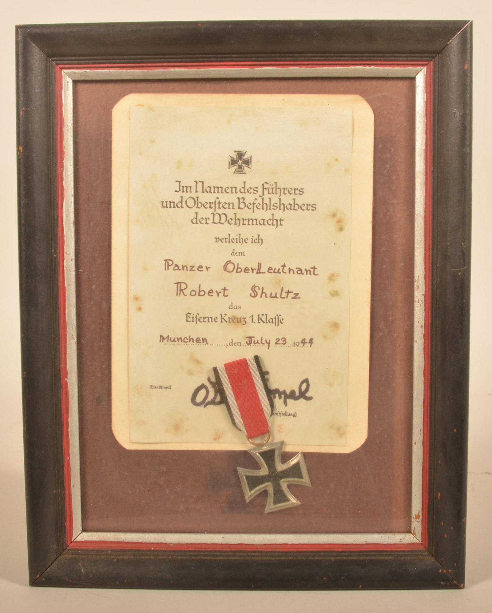 WWII Vet Bring Back German First Class Iron Cross: Document awarding the medal to Robert Shultz on July 23, 1944 in Munchen (Munich) Germany with the Iron Cross. 14"H x 11 1/4"W