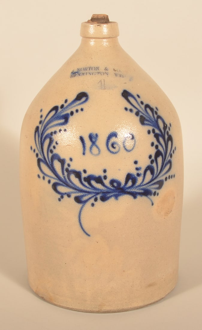 Large 4-Gallon Dated 1860 Norton Bennington Jug: Impressed at top "J.Norton & Co Bennington VT" with "4" underneath. Floral freehand wreath surrounding the date 1860. Very nice contrast between the cobalt and glaze. 18"H