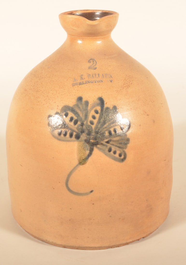 2-Gallon A.K. Ballard Burlington, VT Stoneware Jug: Unusual milk or syrup jug with pouring spout at opening. Stamped on upper shoulder. Freehand floral decoration. Ca. 1870. 13"H