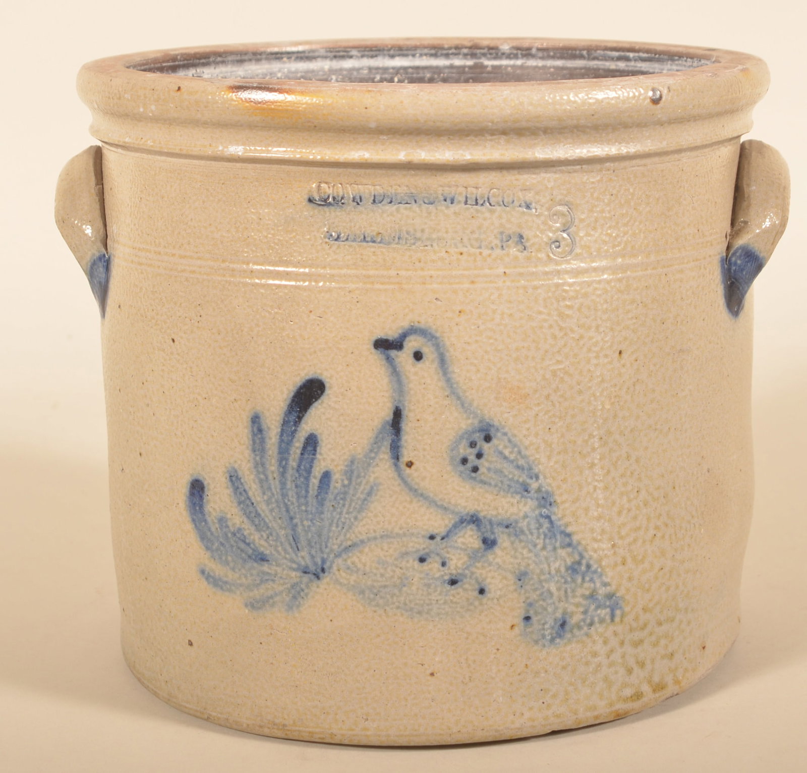 Cowden & Wilcox Freehand-Decorated Bird Crock: Nice 3-gallon wide mouth crock with an uncommon freehand decoration of a paddle-tail bird on a branch. Stamped "Cowden & Wilcox Harrisburg PA" with blue highlights. Freehand decoration under the termi
