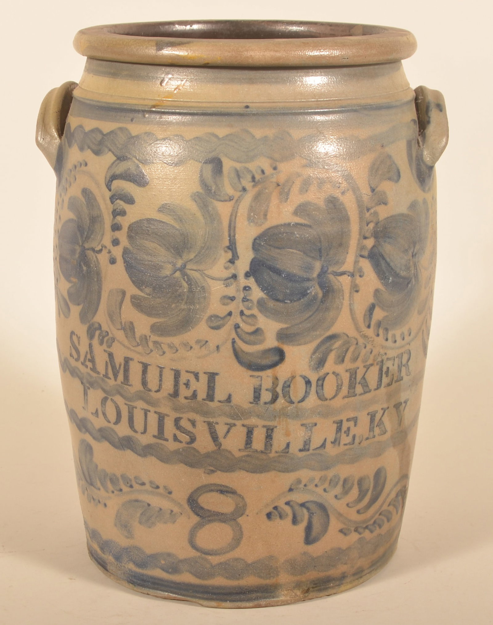 8-Gal. Samuel Booker Louisville, KY Crock: Wonderful, profusely decorated 8-gallon stoneware crock. Samuel Booker crocks are more difficult to find than Bayless McCarthy and this is an exciting find. Attributed to the pottery of James Hamilton