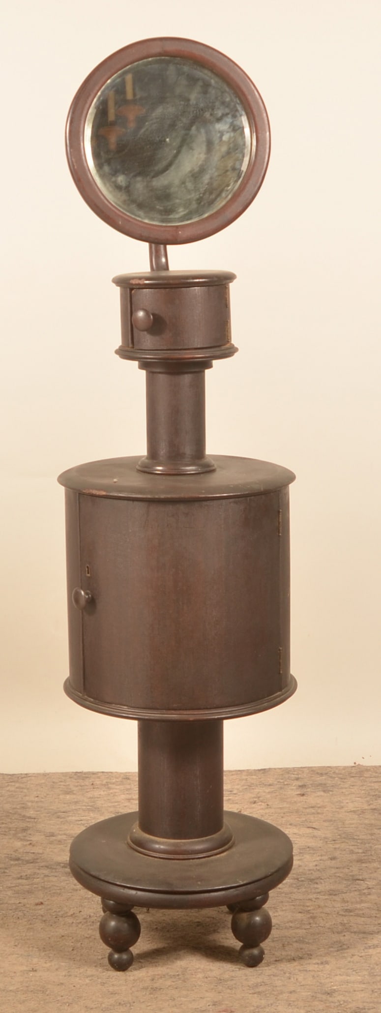 Unusual Mid-19th C. Barrel-Shaped Shaving Podium: This was made for commercial use or a very wealthy client in the 1840-1860 time frame. An adjustable mirror at the top, below this a small round compartment with door connected to a larger round compa