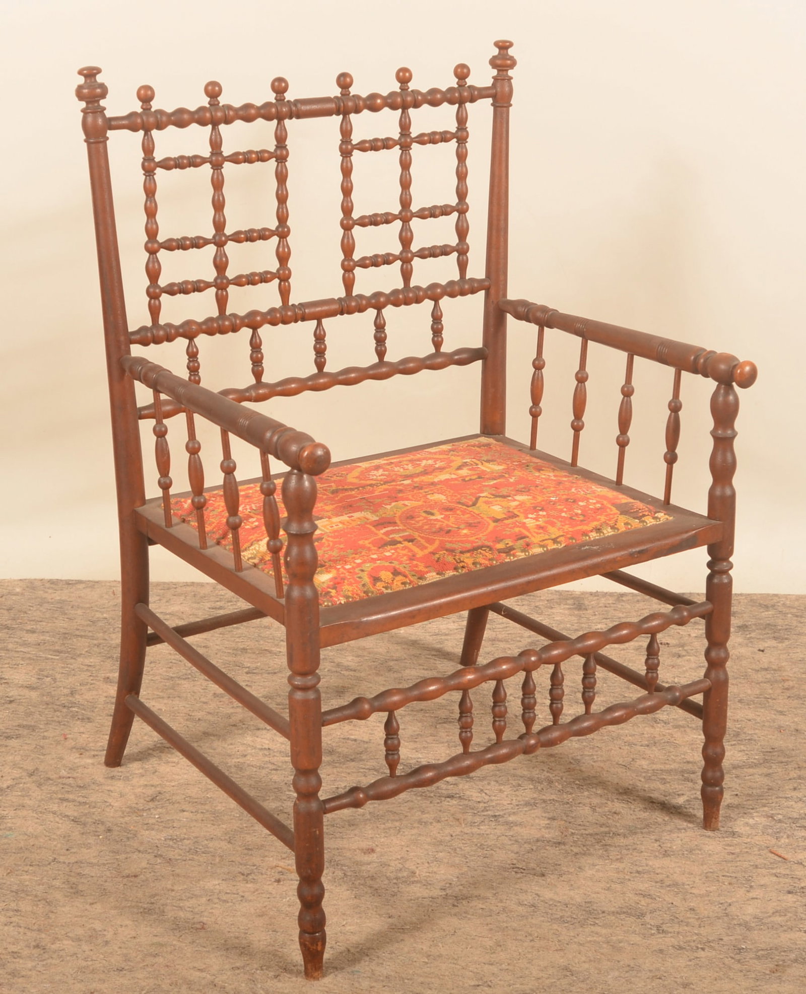 Antique Stick & Ball Armchair: Nicely turned Victorian-period armchair. Interesting needlework seat with farm imagery, tulips, horse weathervane and initials "N S". Original finish. 36"H x 23"W x 18"D
