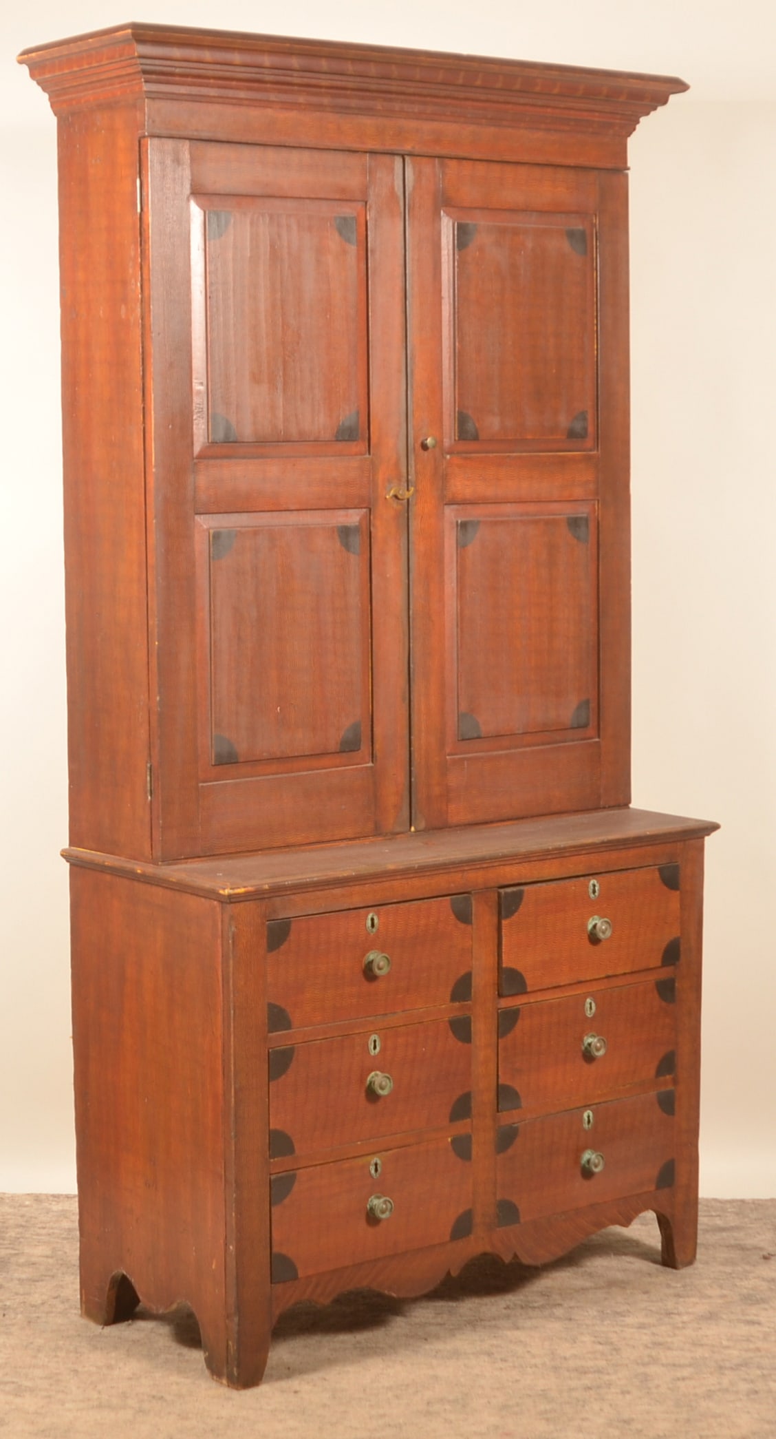 Excellent Paint-Decorated Post Office Cupboard: Exuberantly painted, single-piece cupboard with two raised panels on each door over six dovetailed drawers. Nice, tall crown molding and a shaped apron. Note the carved "S" shaped door keeper.
