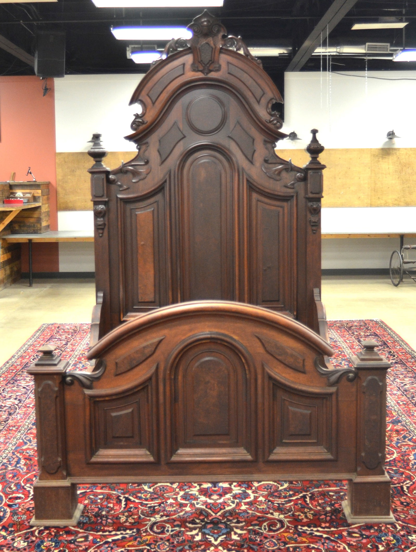 3-Piece Victorian Eastlake Bedroom Suite: Walnut, heavily carved bedroom suite featuring a massive bed, marble-top dresser with mirror and a marble-top washstand. Washstand, 40"H x 36"W x 19"D