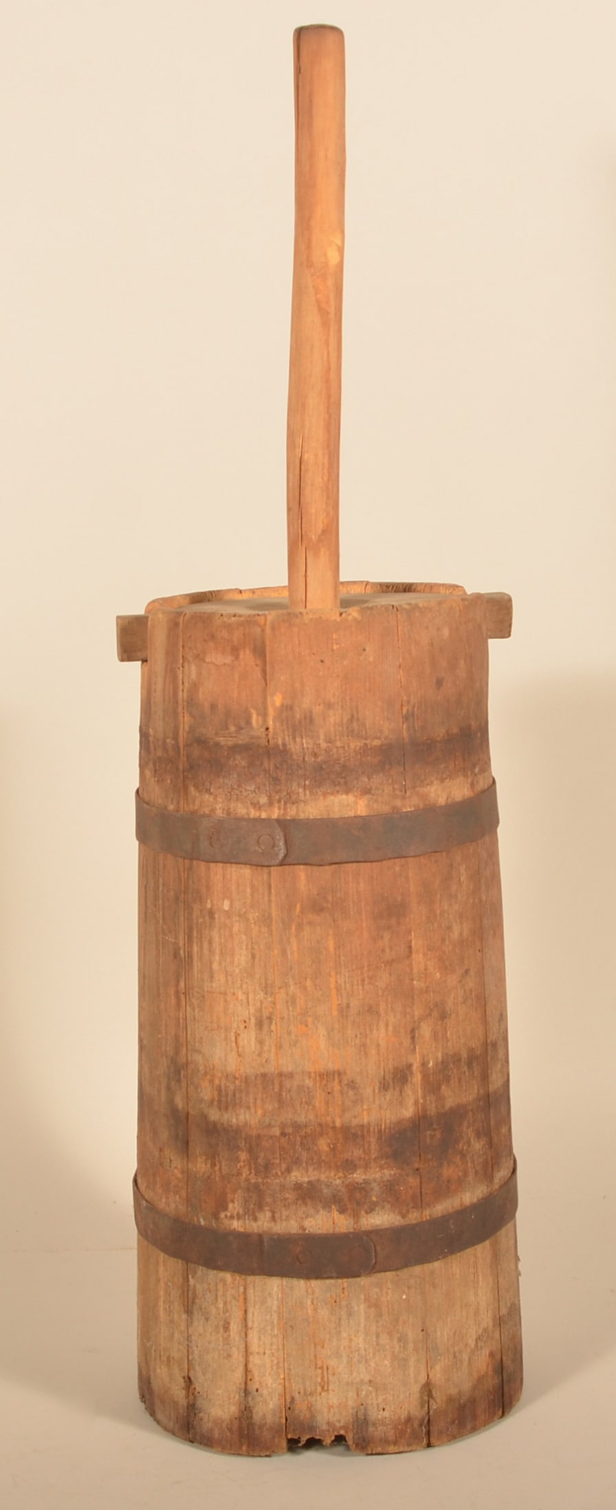 Primitive Wood Butter Churn: Metal banded, tapered wood butter churn. Continental, late-19th century. Provenance: The collection of Russell and Darlene Snyder. 35"H x 9 3/4"D
