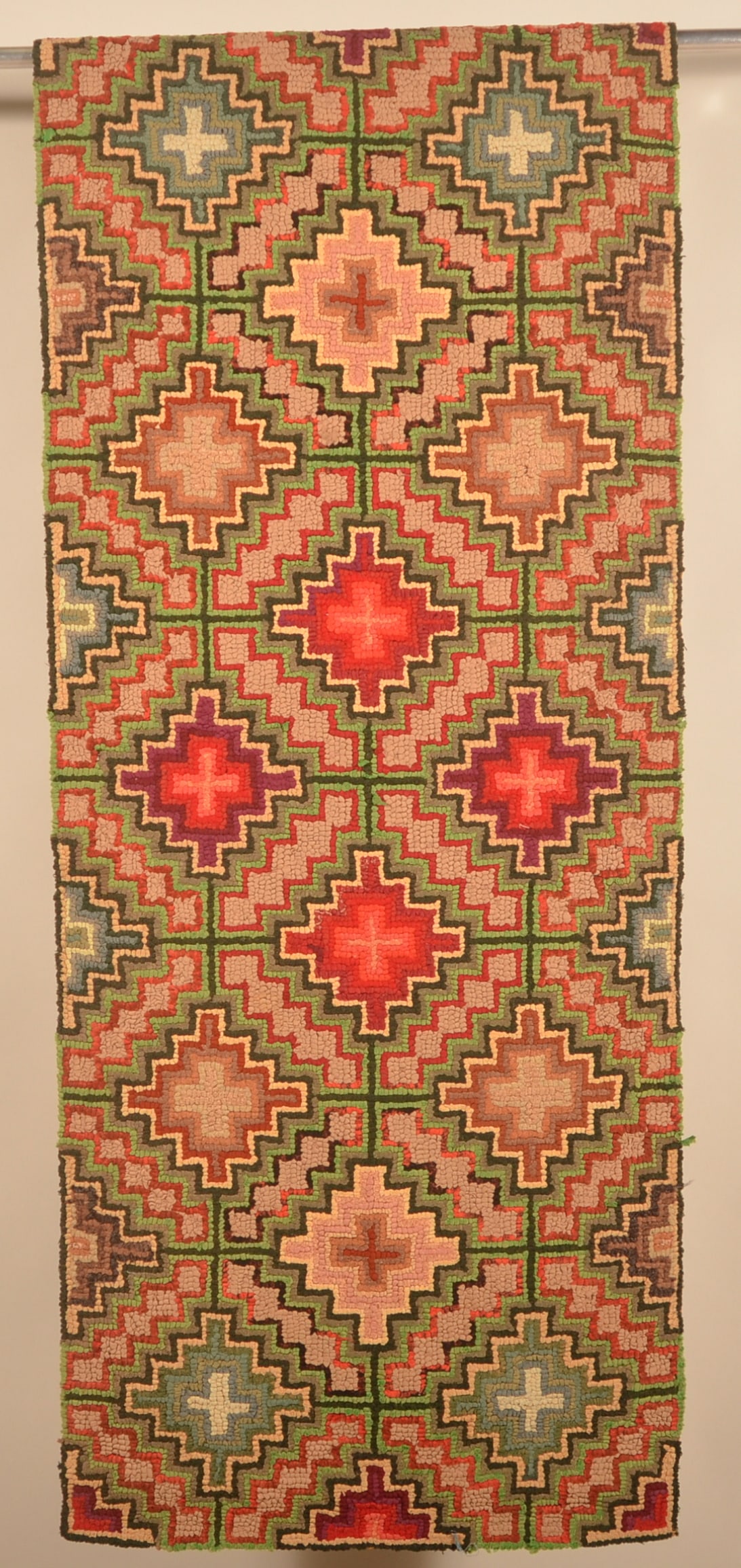 Antique Pennsylvania Hooked Rug: 1930s geometric pattern hooked rug with a good mix of colors. 25 1/2" x 63"