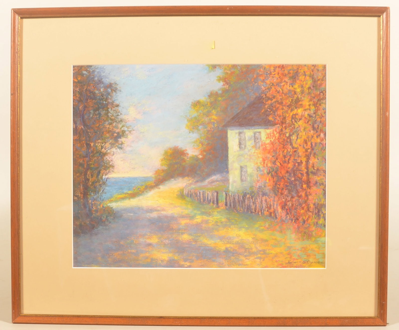 Edwin S. Clymer Signed Pastel: American artist (1871-1949) born in Ohio, but worked in Philadelphia and Gloucester, Mass. Painting of an old house with picket fence facing the ocean. Modern frame. 17 3/4"H x 21"W