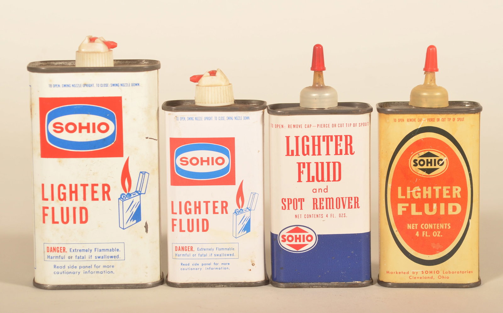 Group Sohio Lighter Fluid Handy Oil Cans: Four different cans including one 8 oz. can, and three 4 oz. cans. Each can is empty. Tallest, 5 1/4"H