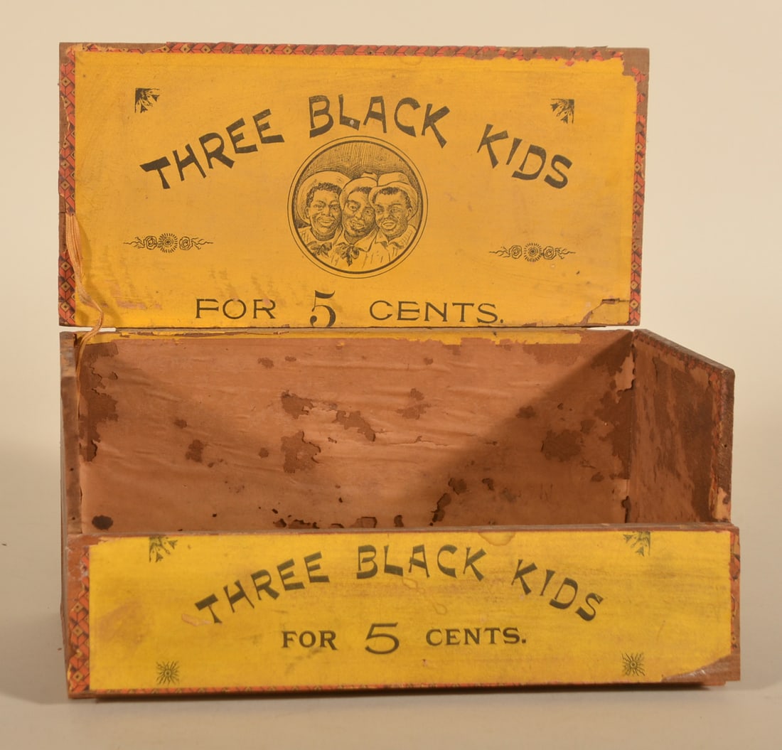 Early "Three Black Kids" 5 Cents Cigar Box: Vibrant colors and fold-down front. Flaps are still firmly secured. 1898 tax stamp. Held 100 cigars. 5"H x 9 3/4"W x 4 1/2"D