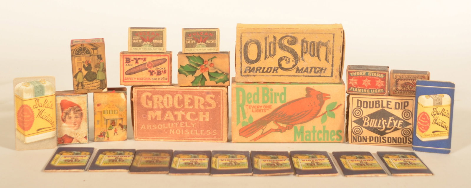 Victory Tobacco Cigarette Papers & Matchbooks: Nine unused Victory Smoking Tobacco paper holders for rolling papers featuring a Native American warrior on horseback. Two different Duke's Mixture tobacco paper holders. Collection of matchbooks, one