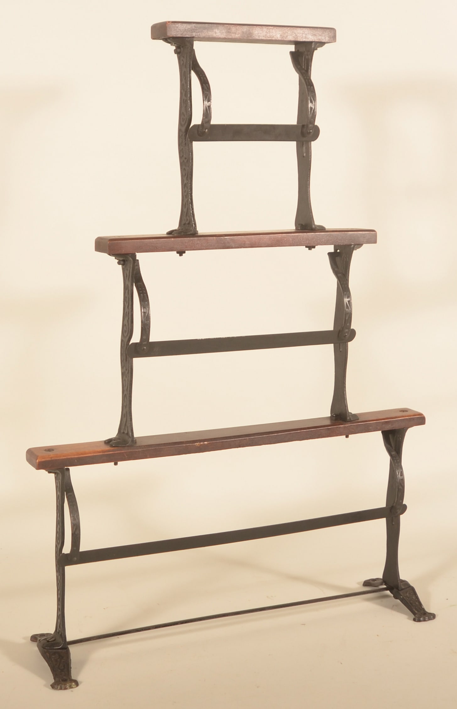 3-Tier Country Store Iron & Wood Paper Rack: Nice, graduated rack with embossed iron legs and original finish on the wood tops. 21 3/4"H x 13"W x 7"D