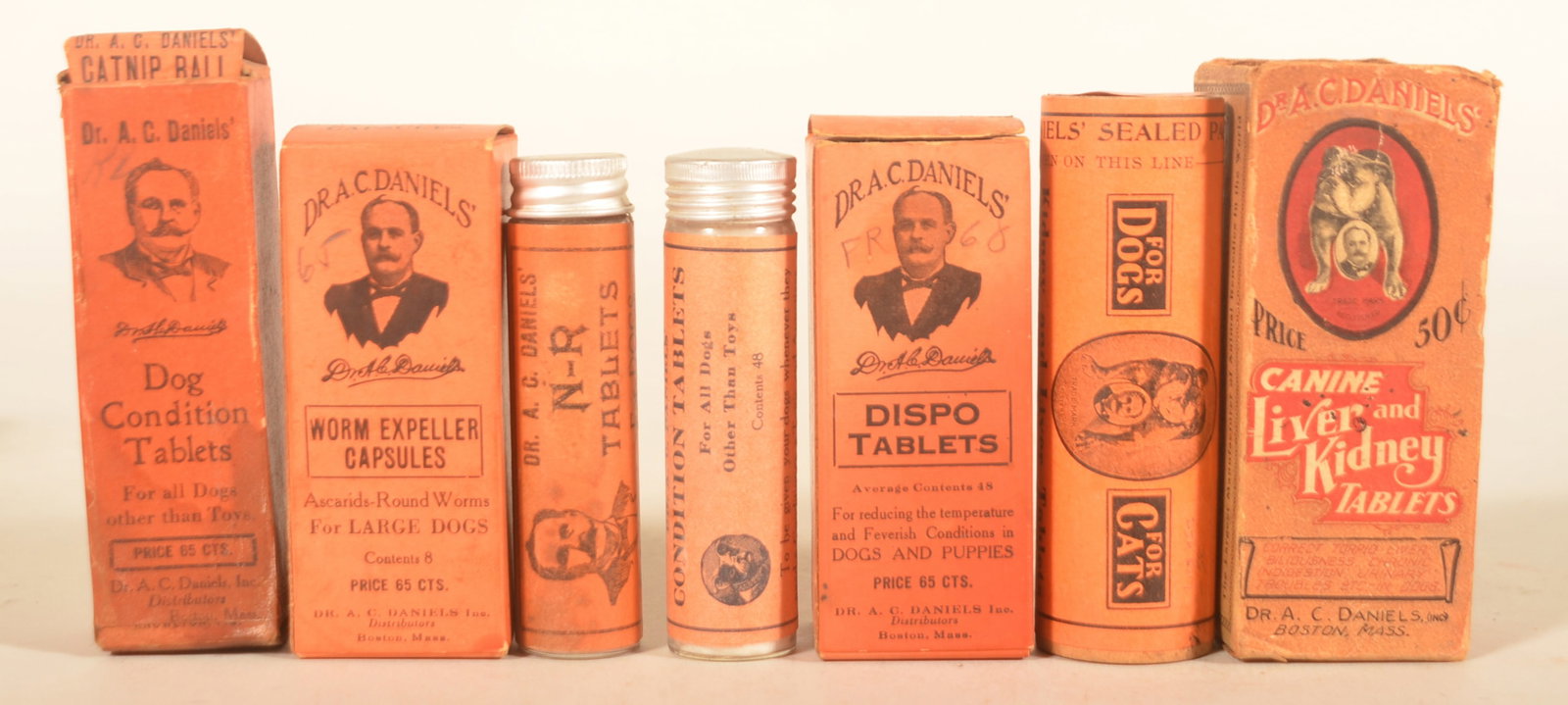 Dr. Daniels' Veterinary Advertising Dog Packages: Six different packages focused solely on curing dogs and their ailments. Early bottle and box for Canine Liver and Kidney Tablets (missing top of box), bottle and box for Dog Condition Tablets