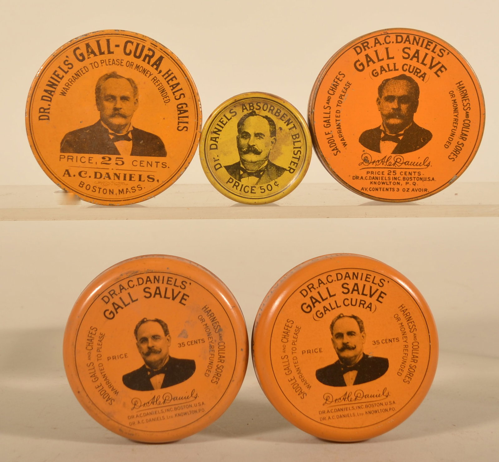 Small Group Dr. Daniels' Advertising Vet Tins (1 of 4)