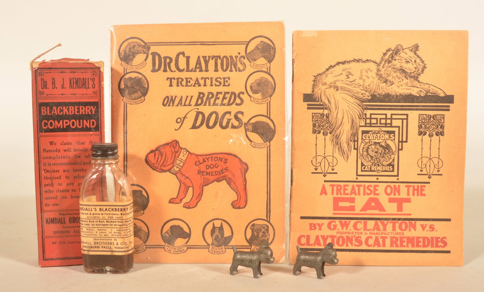 Clayton's, Kendalls & Ideal Dog Food Advertising: Really nice group of assorted veterinary advertising. Group includes two tiny figural metal puppies embossed with Ideal Dog Food on one side and Good Luck on the other. Used as premium giveaways. Two 