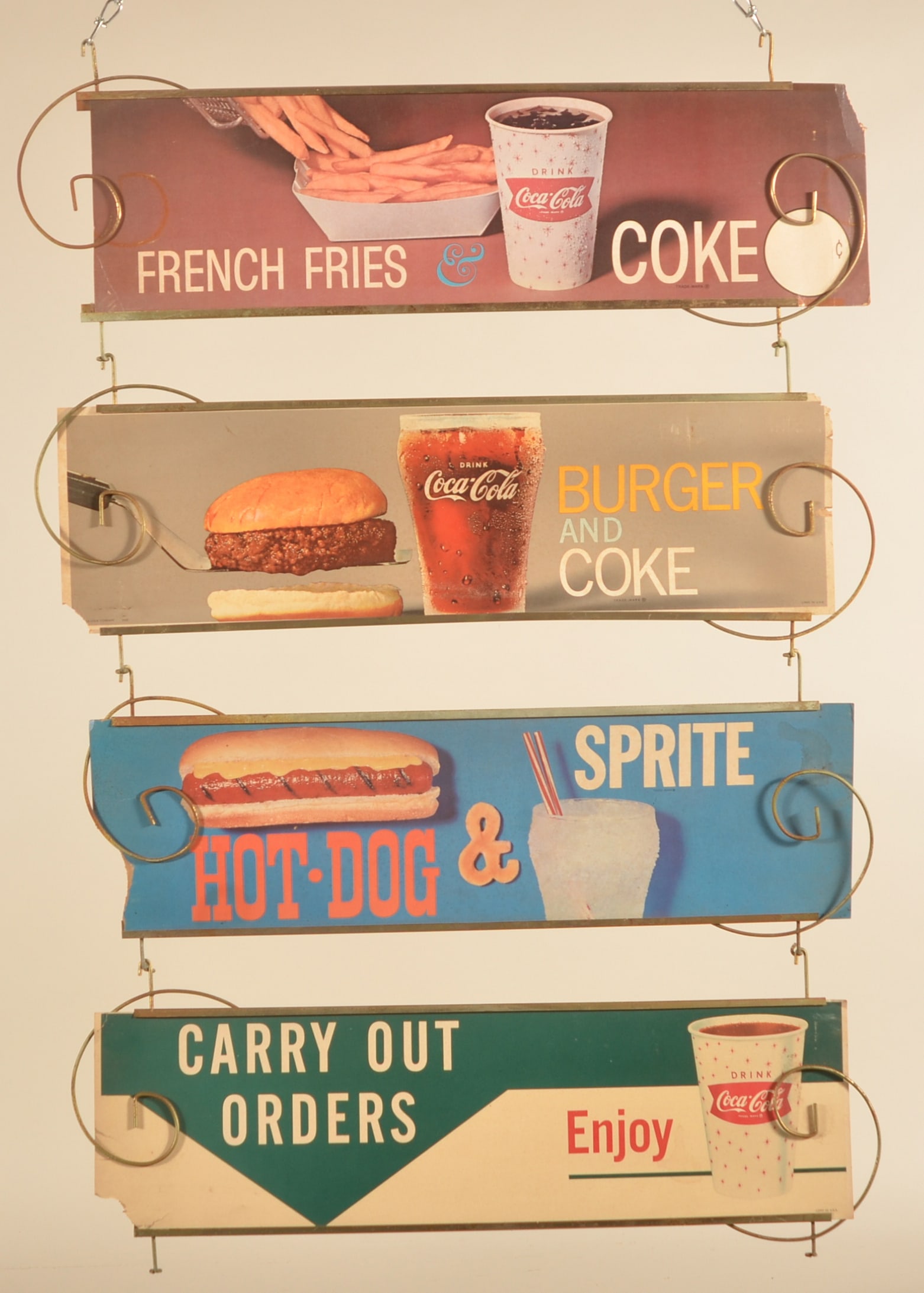 Unusual 1968 Hanging Coca-Cola Checkout Sign: 4-tier adjustable hanging advertising sign featuring Coke and Sprite. Meant to hang in the cash register area of the dime store or diner as an inducement to buy more Coke with their hamburgers and hot