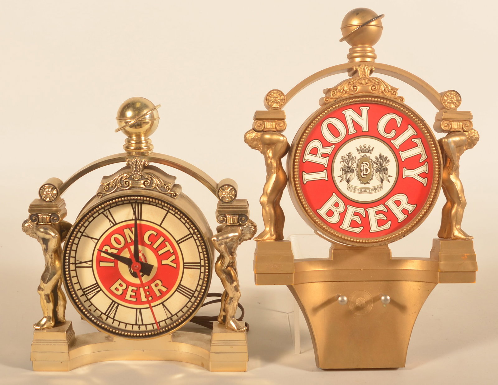 Iron City Beer Advertising Clock & Coat Hanger: Pair of vintage molded plastic bar decorations, each with the same motif. Hanging or countertop clock in working condition and a molded plastic hanging hat rack. Both marked Pittsburgh Brewing Company