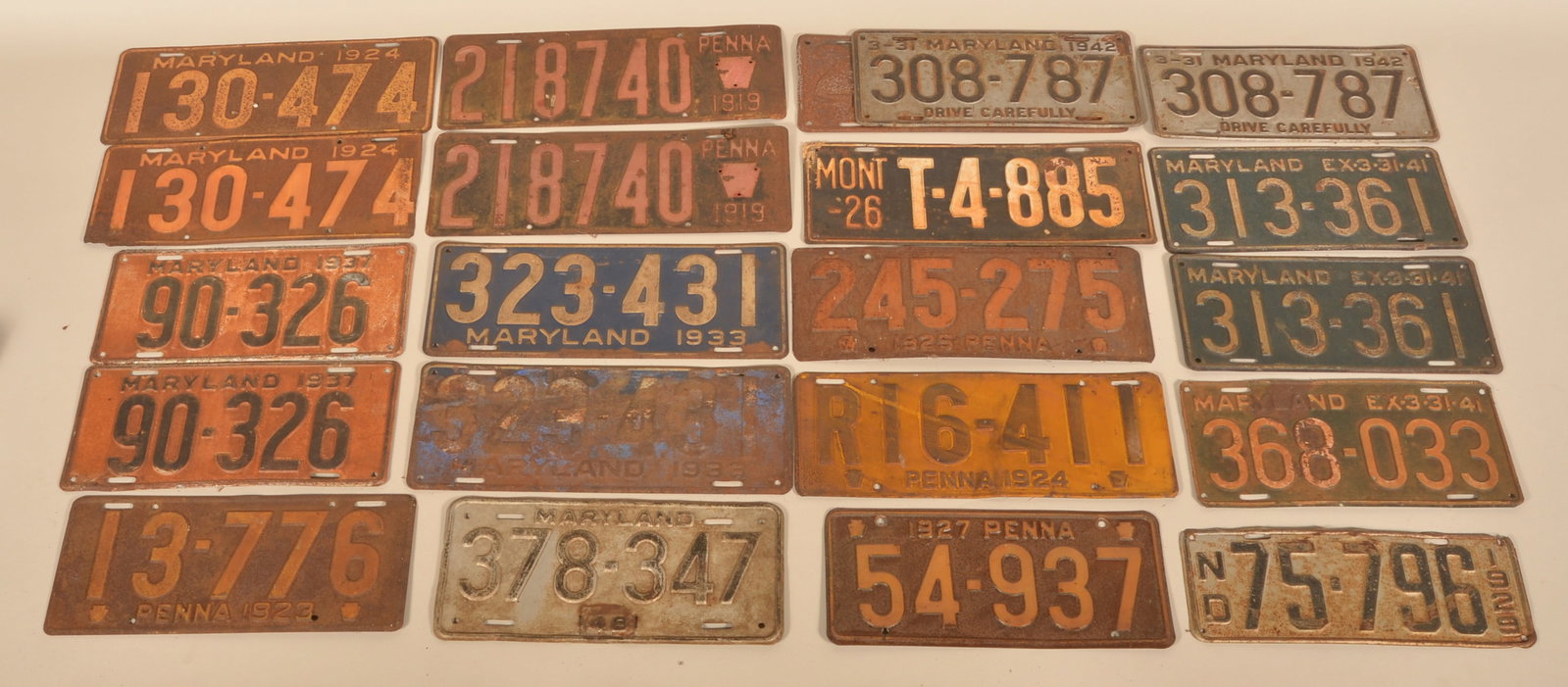 Collection PA /MD/ND/MT Antique Car License Plates: 1926 single Montana, 1929 single North Dakota. Matched pair 1924, 1933, 1937, 1941, 1942 and 1948 Maryland plates. Single Maryland plates from 1933 and 1941. Matched pair 1919 Pa. plates. Single Pa.