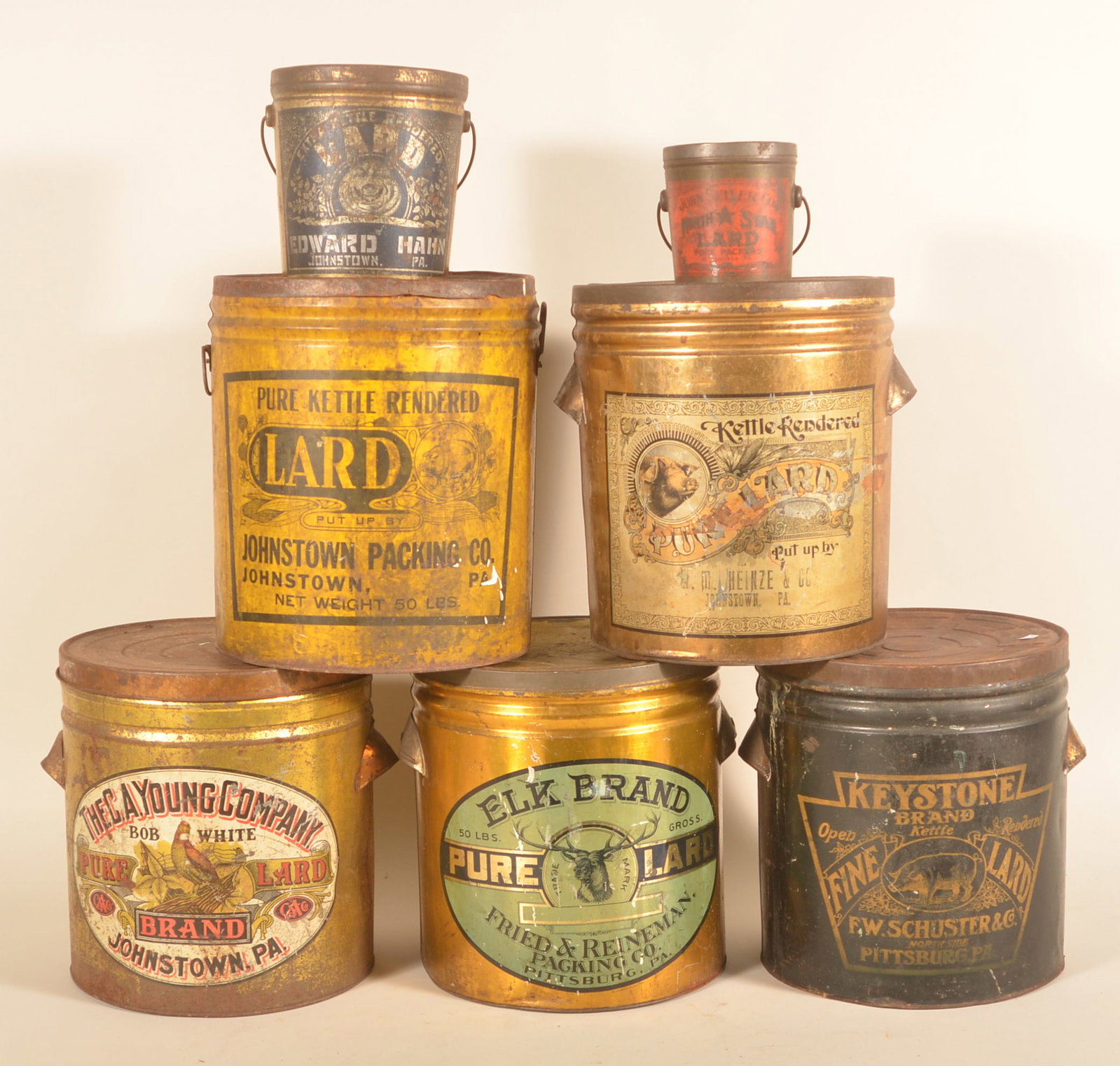Collection of Western PA Advertising Lard Tins: Seven different lard tins with nice graphics. John Seiler and Keystone Brand tins from Pittsburgh. Johnstown Packing Co, C.A.Young, Elk Brand, Heinze & Co and Edward Hahn from Johnstown, Pa. Tallest,