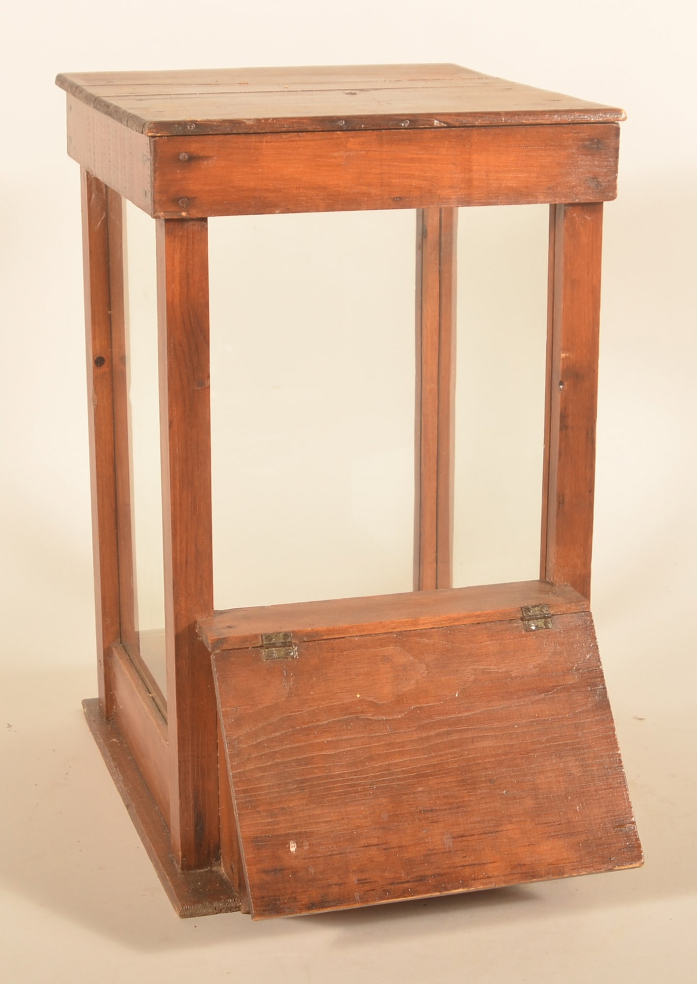 Country Store Glass & Wood Countertop Chip Case: 1920s vertical display case with removable top and lift lid in front for selling chips or pretzels. Pine with glass sides. Provenance: The collection of Russell and Darlene Snyder. 21"H x 12 1/2"W x