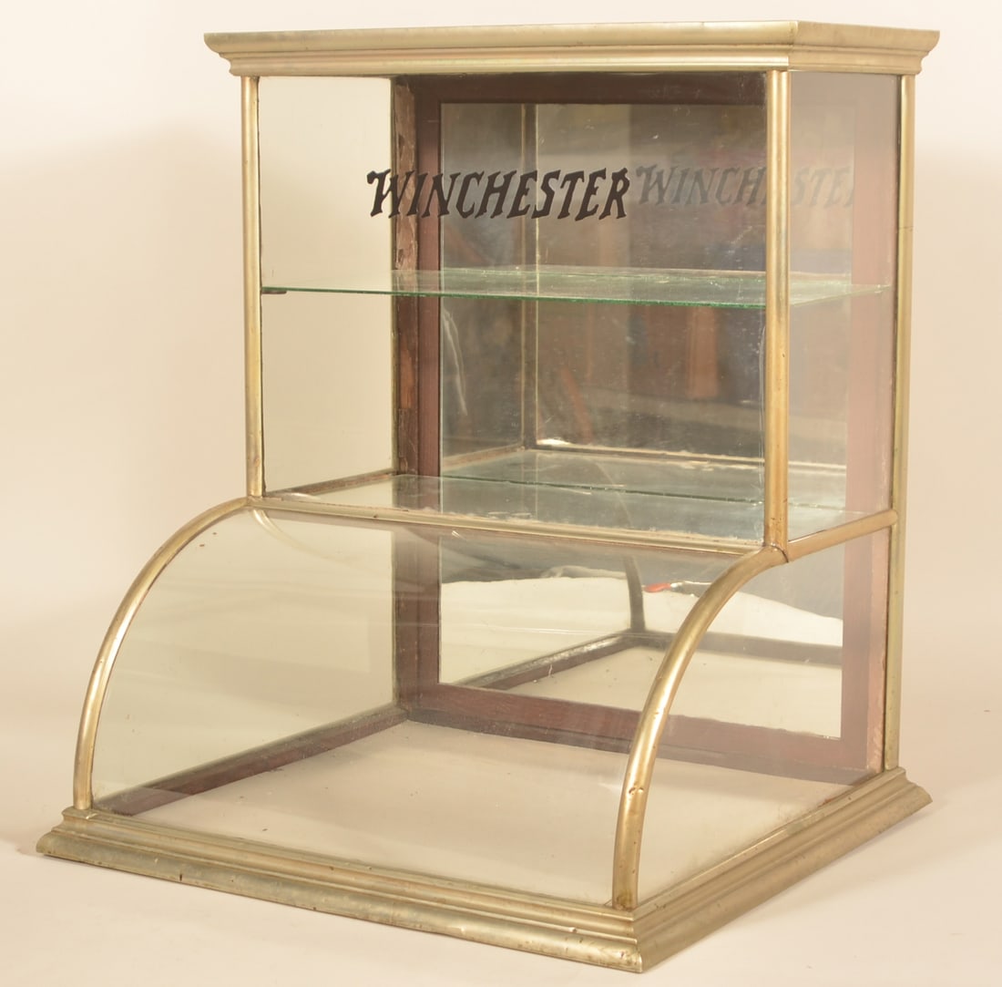 Antique Small Nickel-Plated Tower Showcase: Perfect store counter size for display. Nickel-plated, wood frame with one interior shelf. Provenance: The collection of Russell and Darlene Snyder. 26 3/4"H x 22 3/4"W x 20"D
