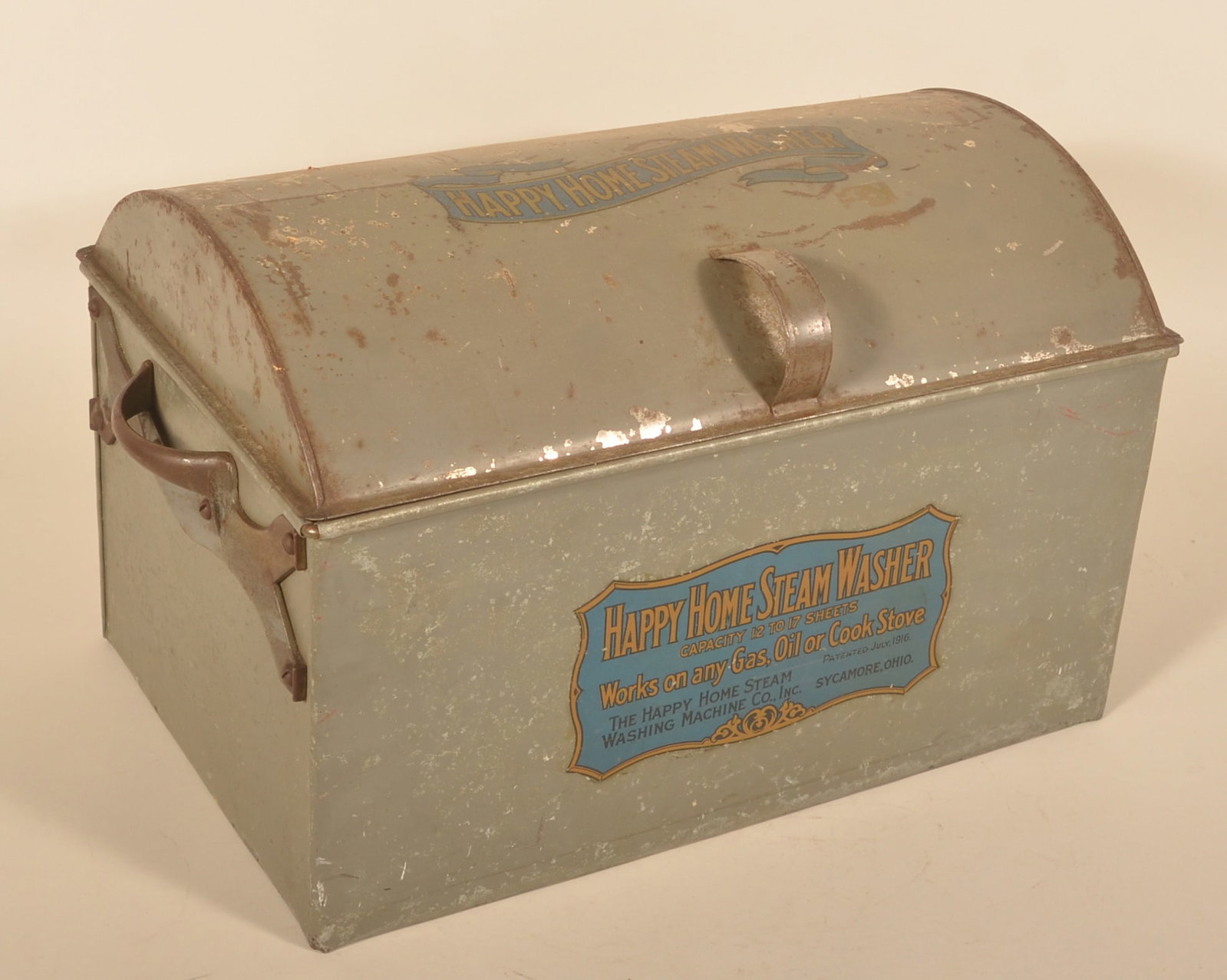 Unusual "Happy Home Steam Washer" Clothes Washer: Tin lithographed, lift lid with handle, body marked on lid and front. Patent date 1916. Original tumbler inside. The owner would place this on their gas or oil cook stove, fill it with water, place