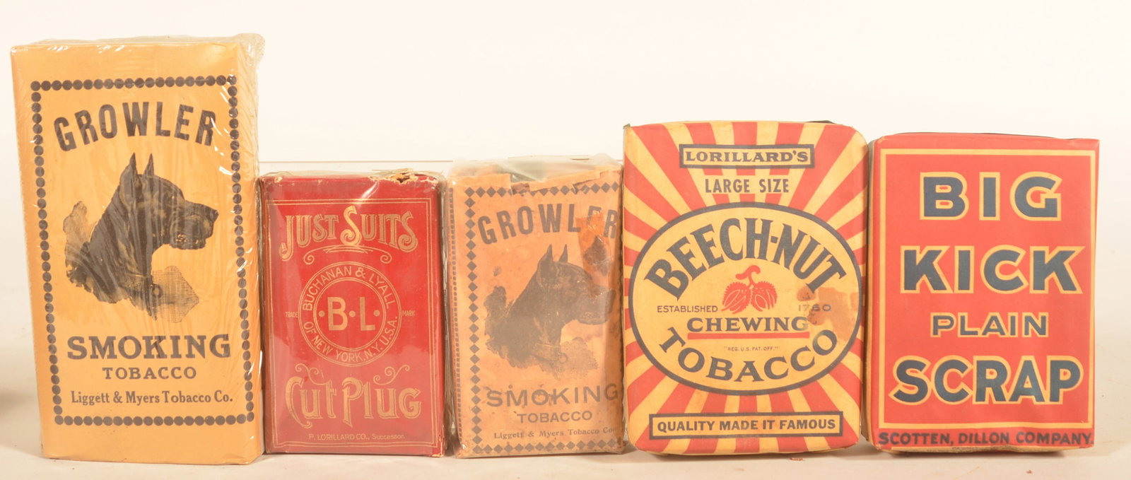 Group Antique Tobacco Packages: Five pouches total including a crisp Just Suits (small hole in top), Big Kick Plain Scrap, Beech Nut and two different-size "Growler" pouches by Liggett & Myers. Provenance: The collection of Russell