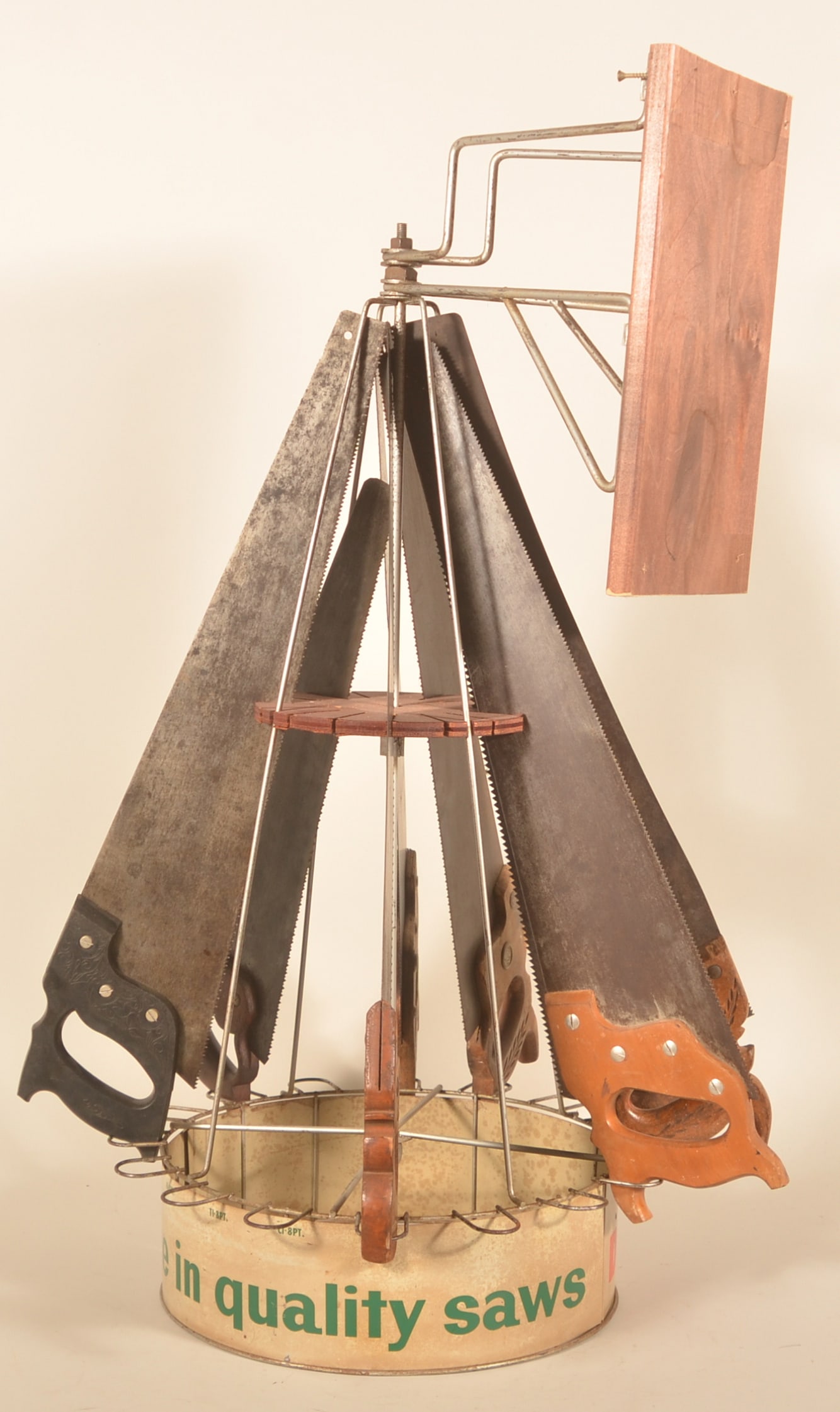 Disston Saw Hanging Hardware Store Display: Vintage display with advertising around bottom band. Comes with a group of saws for display. Provenance: The collection of Russell and Darlene Snyder. 39 1/2"H