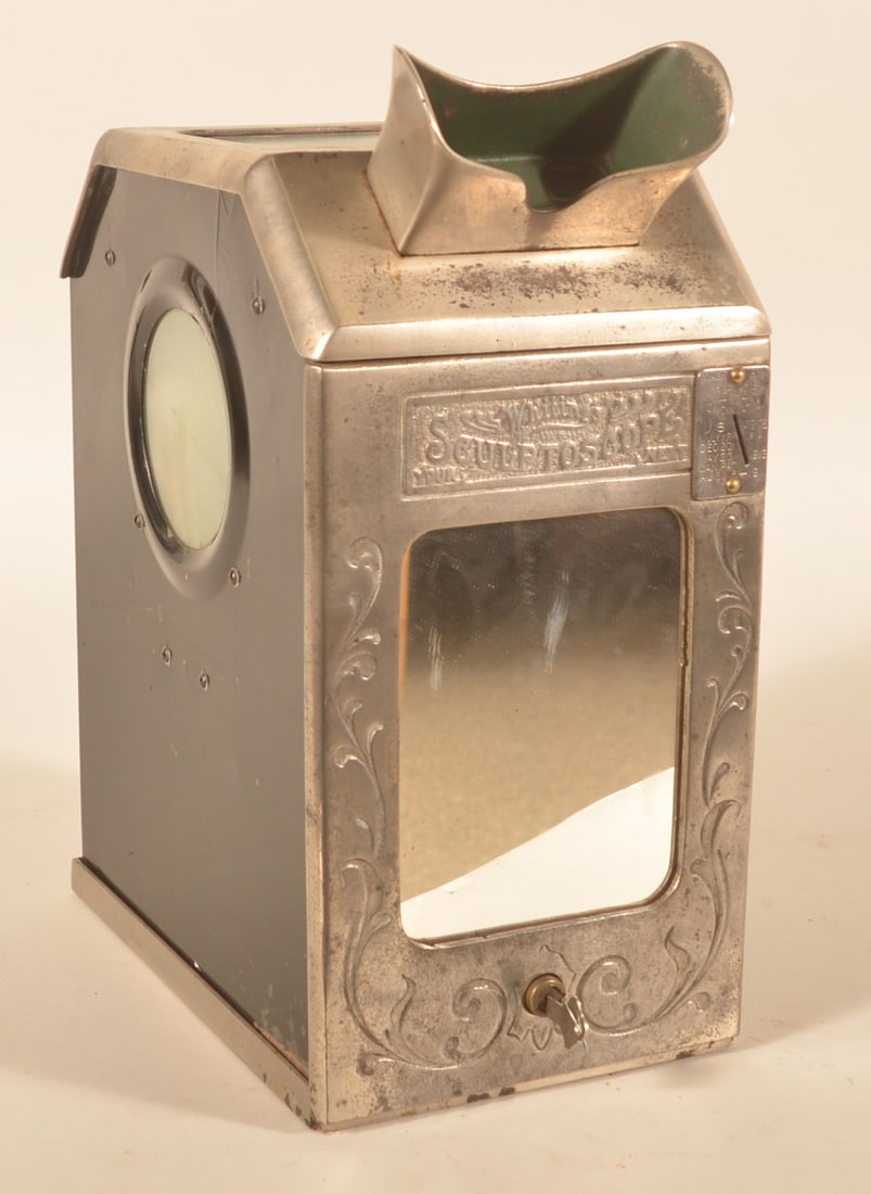 1913 American Novelty Co "Whiting's Sculptoscope": Nickel-plated vending machine which allowed the user to view stereoscope images with a 3-D effect. The company was founded in 1913 and the last patent date on the coin slot is from that year. Mirrored